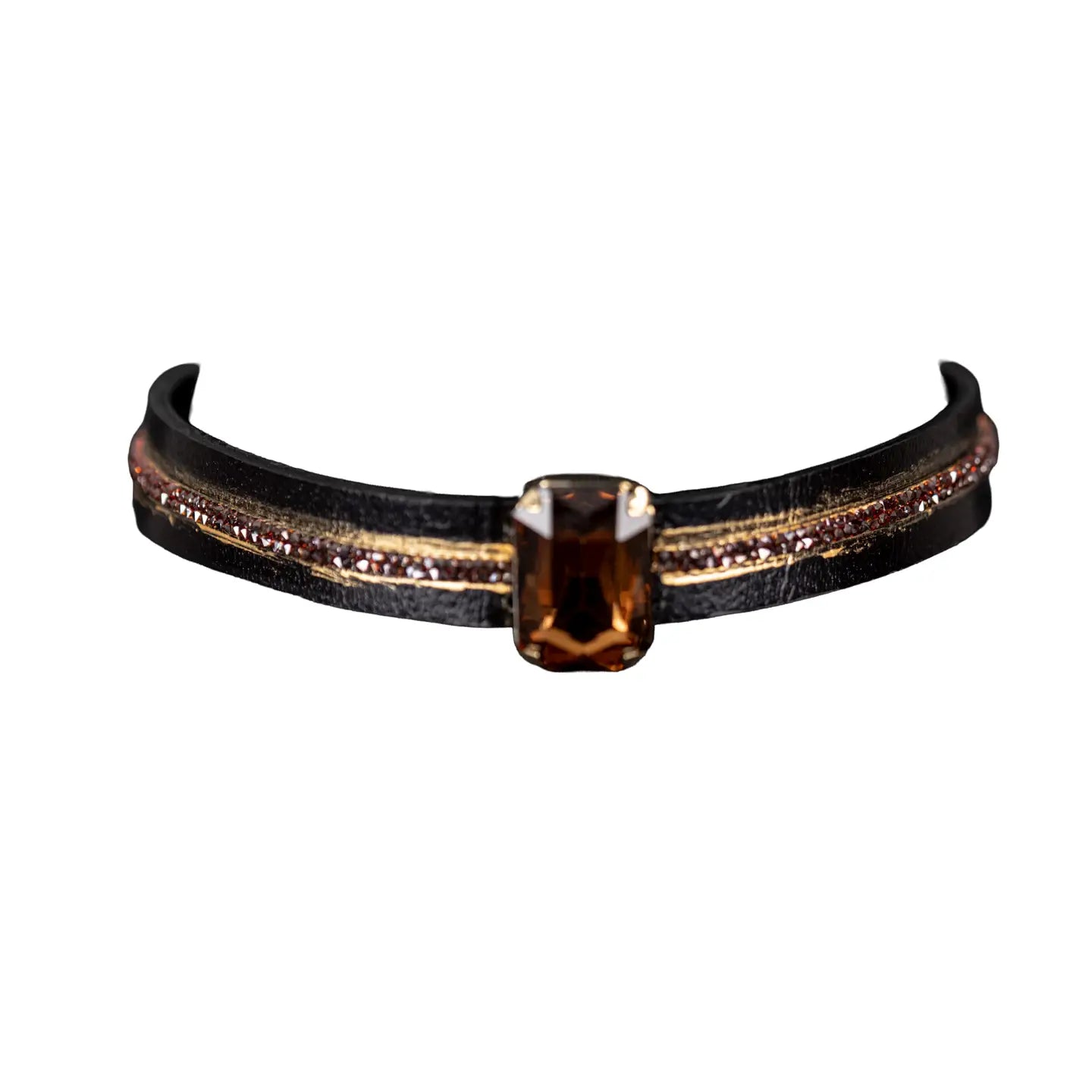 Black leather choker with a central brown rectangular crystal and fine rhinestone and gold detailing along the band, displayed on a white background.