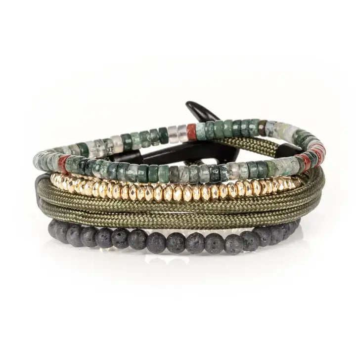 Green multi-layer men’s bracelet featuring natural stone disc beads, gold hematite spacers, olive braided rope layers, and lava stone bead strand on a light background.
