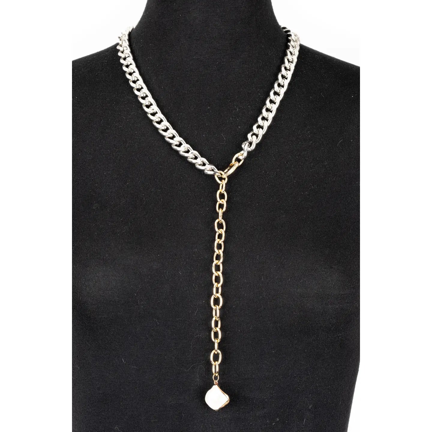 Two-tone silver and gold chain Y necklace with white stone pendant on white background.