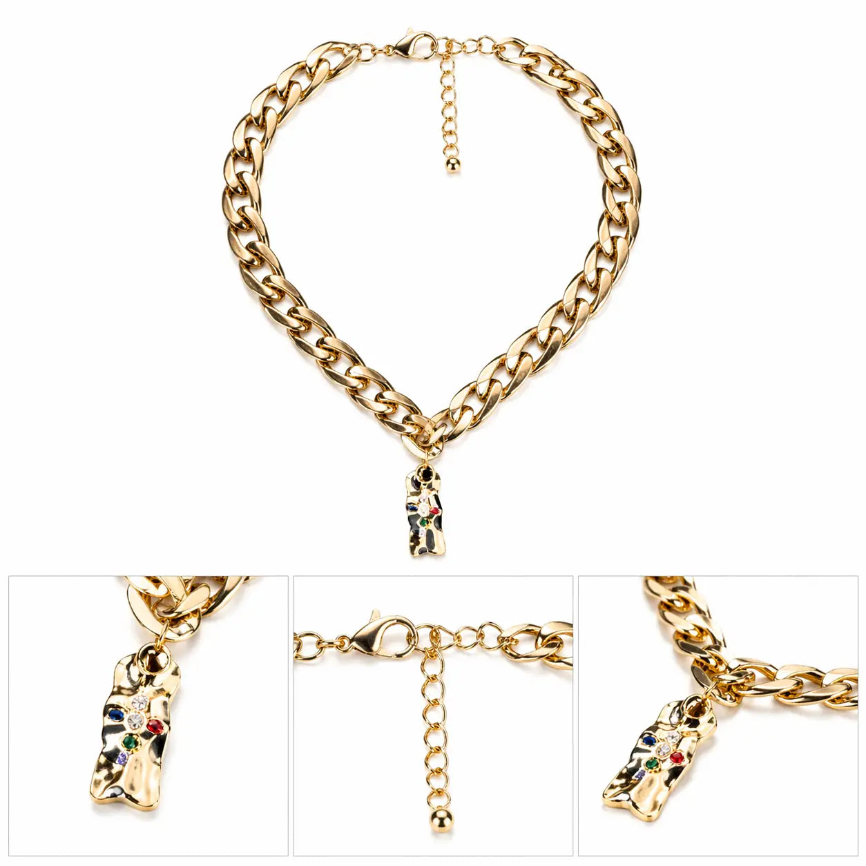 Gold chunky chain necklace with sculptural abstract pendant and subtle crystal accents on white background.