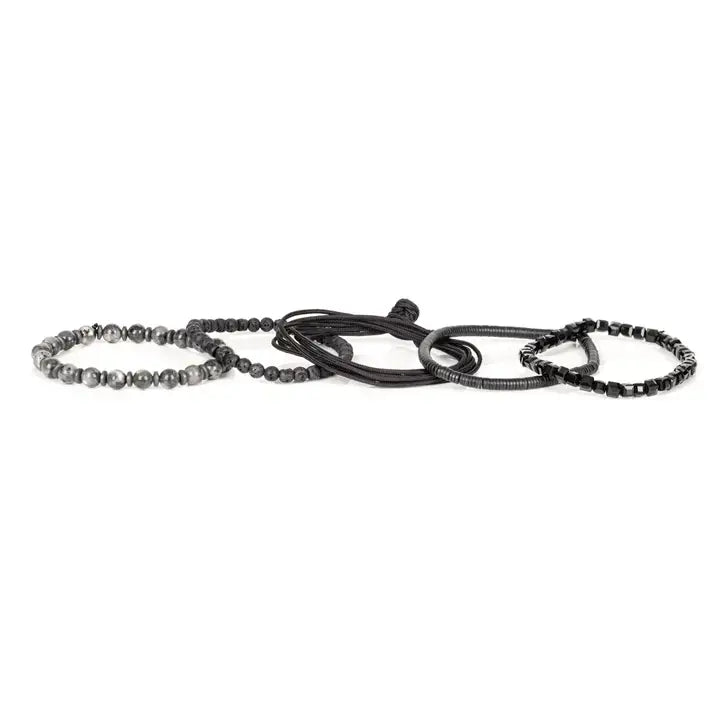 Men’s layered bracelet set featuring black faceted crystal beads, matte black lava stone beads, black braided cord, hematite spacer beads, and polished gray stone beads, stacked in a bold monochromatic luxury design on a white background.