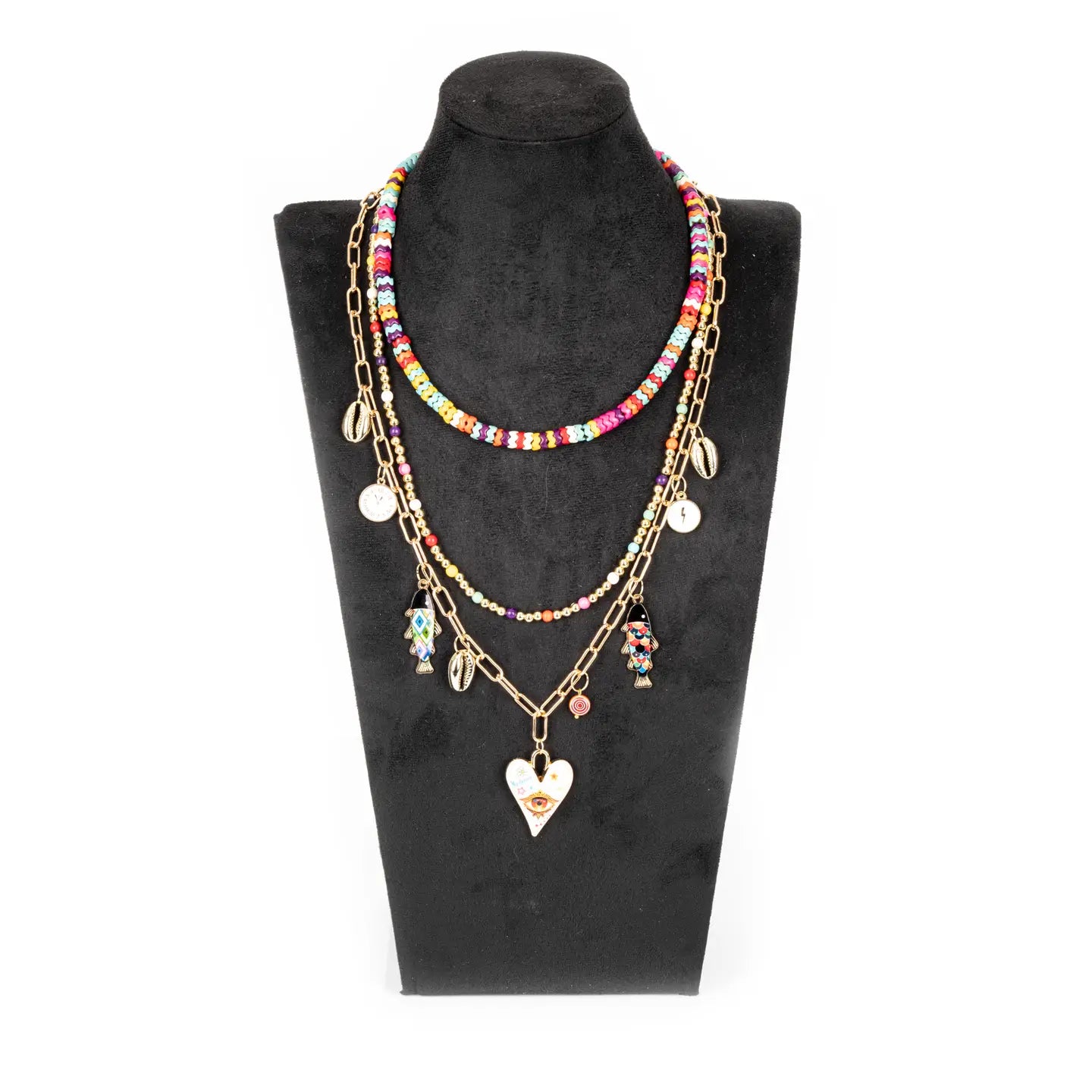 Colorful layered necklace with multicolor beads, gold chains and evil eye heart pendant on white background.