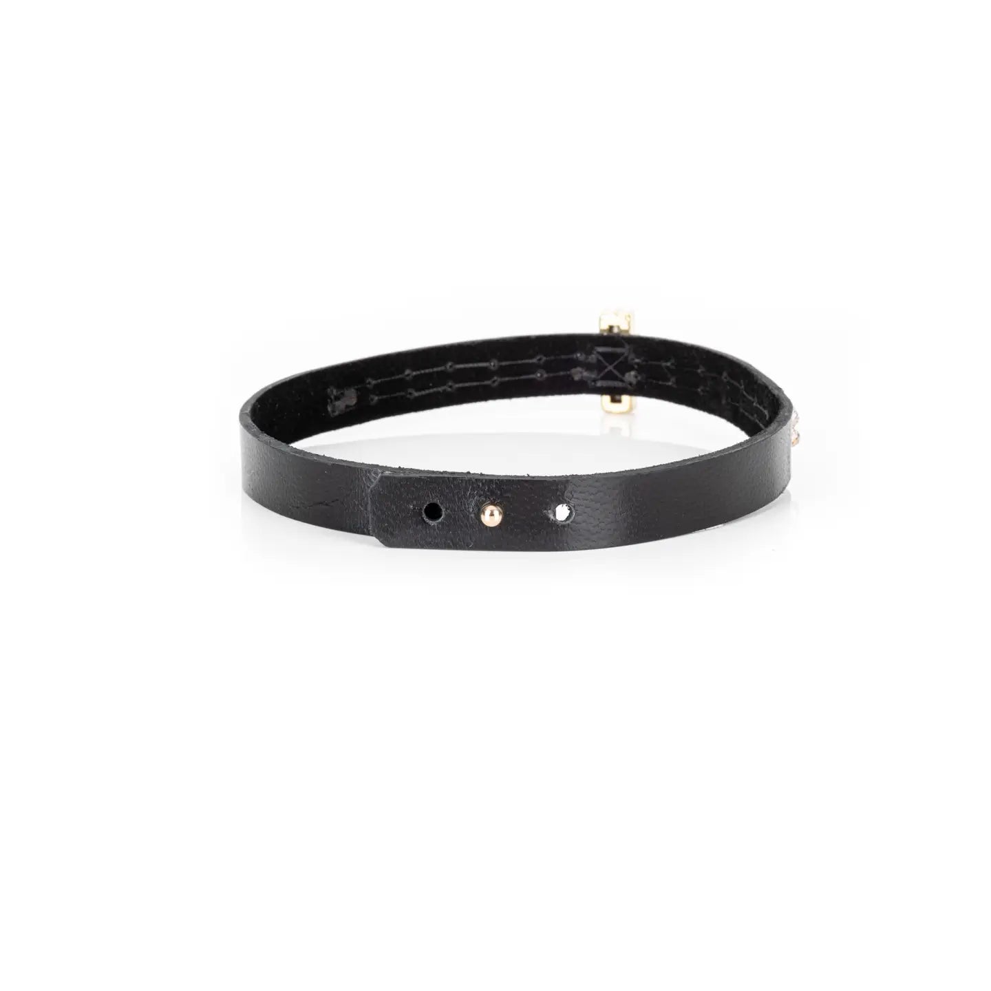 Black leather choker with a central champagne crystal and mixed white and gold crystal detailing along the band, displayed on a white background.