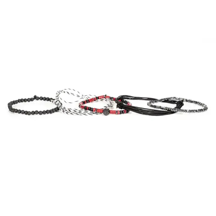 Black and red layered men’s bracelet set with lava stone beads, braided rope wraps, metallic accents, and pavé centerpiece on white background.