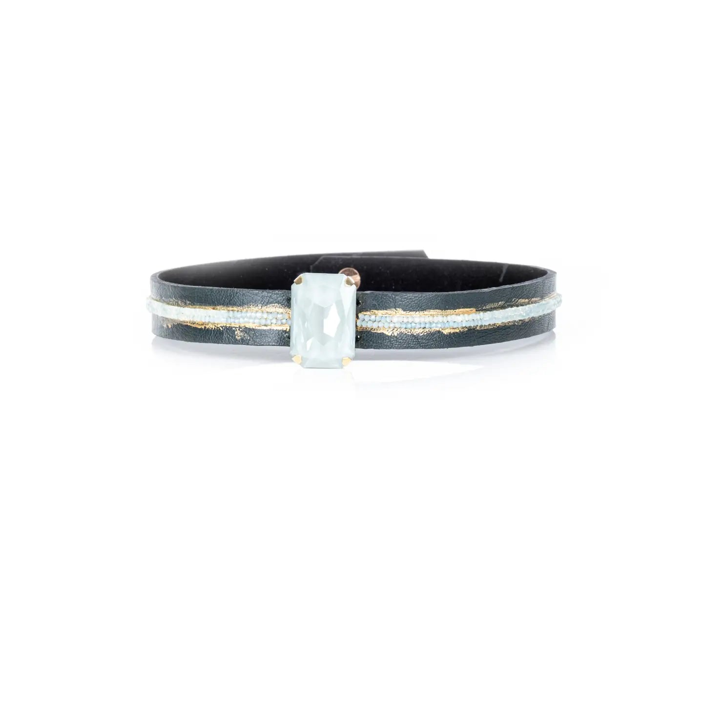 Black leather choker with a central rectangular white crystal and subtle gold and crystal detailing, displayed on a white background.