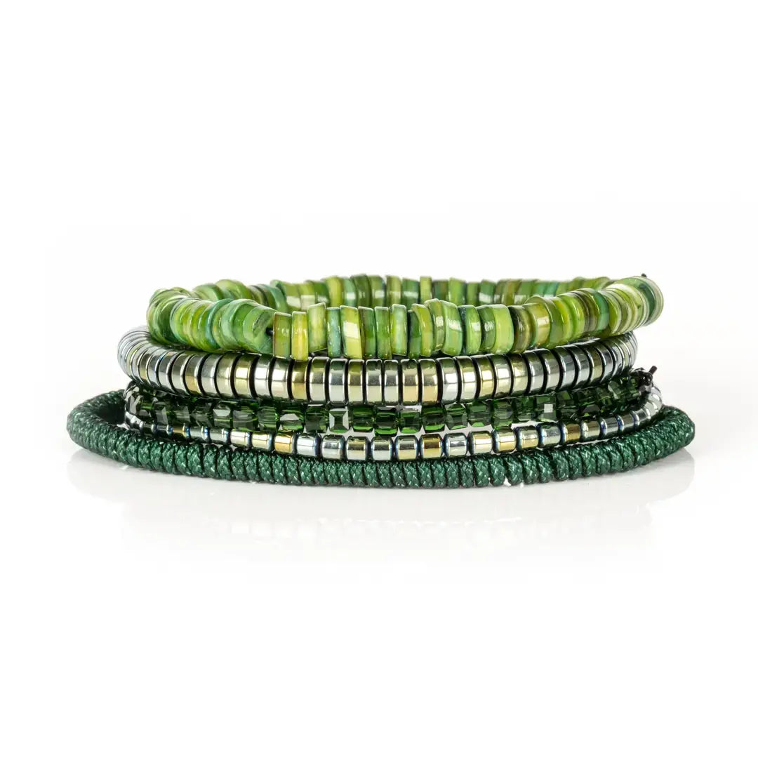 Green multi-layer men’s bracelet set featuring natural green stone disc beads, metallic hematite strands, faceted green crystal beads, and braided green rope on a light background.