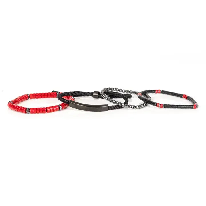 Men’s layered bracelet set featuring black and red heishi beads, faceted hematite crystal beads, black braided cord, a gunmetal ID bar centerpiece, and black accent beads, stacked in a bold contemporary luxury design on a white background.