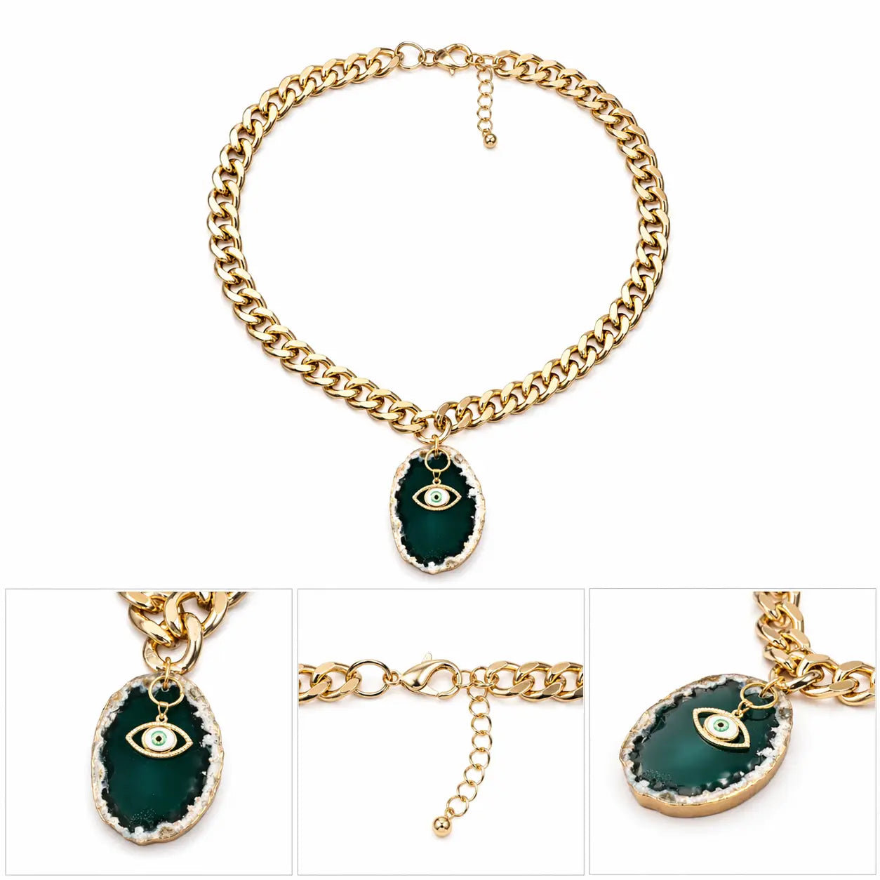 Gold chunky chain necklace with green stone pendant and evil eye charm on white background.