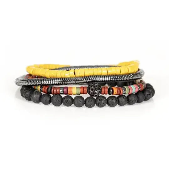 Men’s layered bracelet set featuring matte black lava stone beads, bright yellow heishi beads, multicolor tribal-inspired disc beads, a gunmetal pavé accent bead, and silver-tone coil wrap beads, stacked in a vibrant bohemian luxury design on a white background.