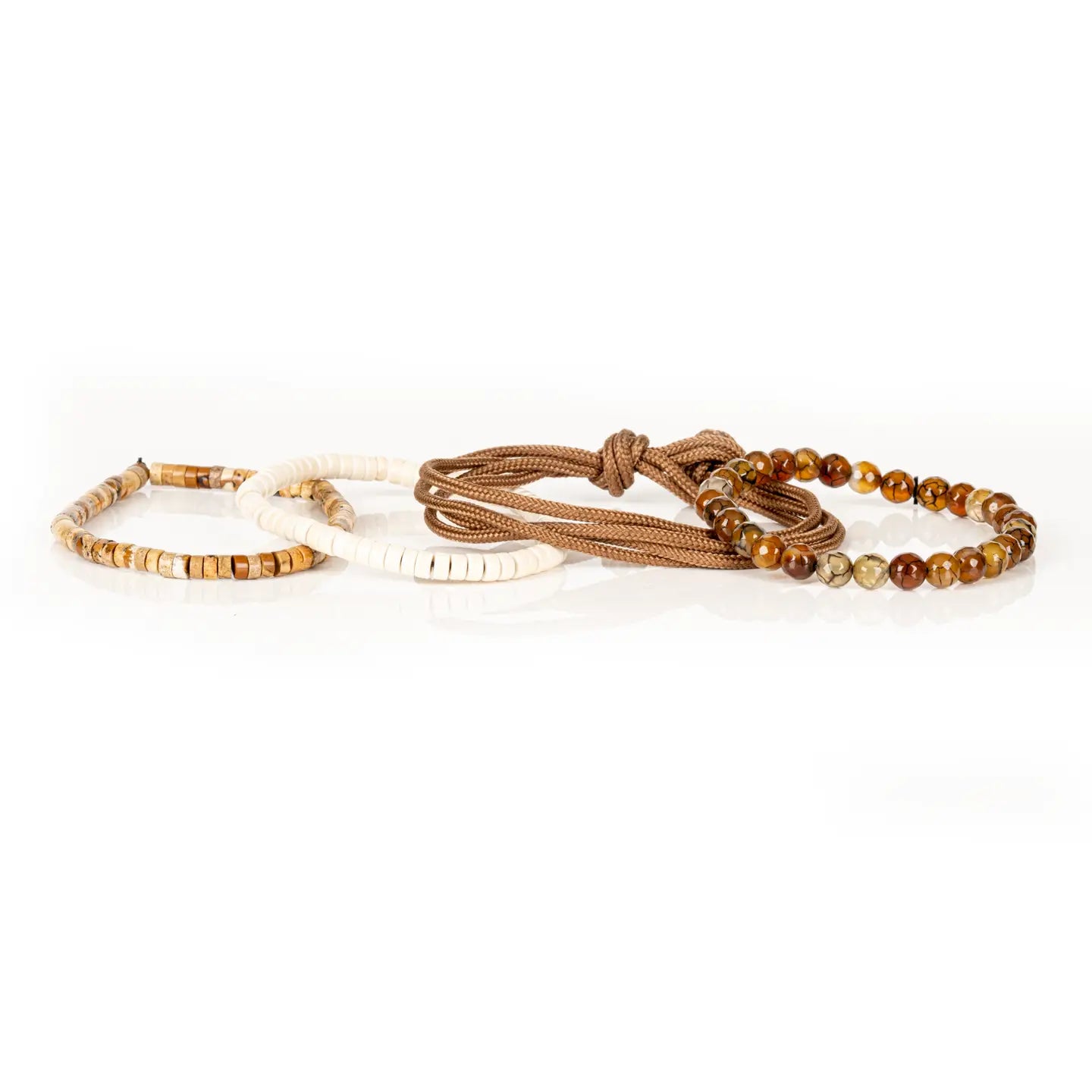 Men’s layered bracelet set featuring faceted brown crackle agate beads, tan braided cord wraps, white heishi beads, and natural earth-tone stone disc beads, stacked in a refined bohemian luxury design on a white background.