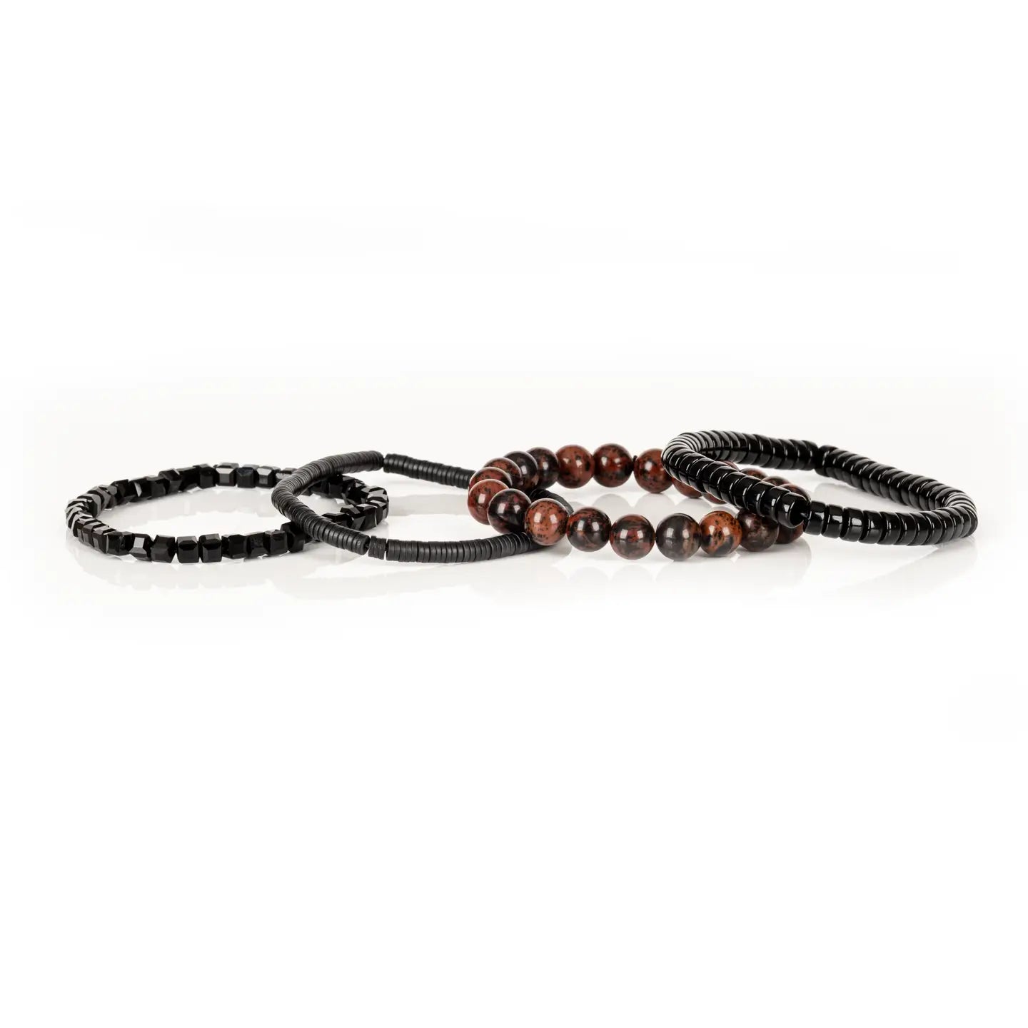 Men’s layered bracelet set featuring black lava stone disc beads, black braided cord wraps, white and gray marbled natural stone beads, black hematite coil beads, and light gray heishi beads, stacked in a sophisticated monochromatic luxury design on a white background.