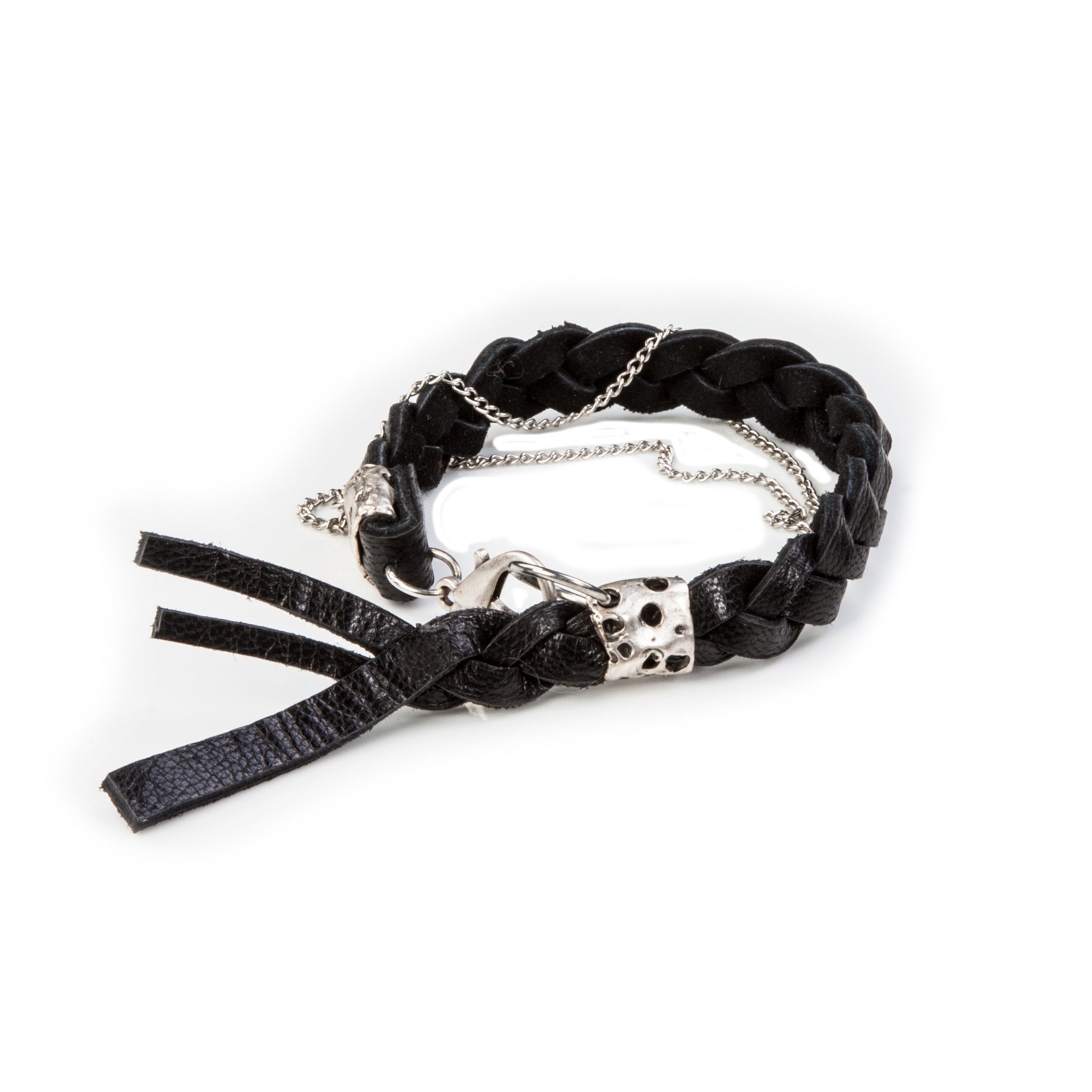 Handmade men's black braided leather bracelet featuring silver-tone chains, artisan metal accents, and leather tassel details.