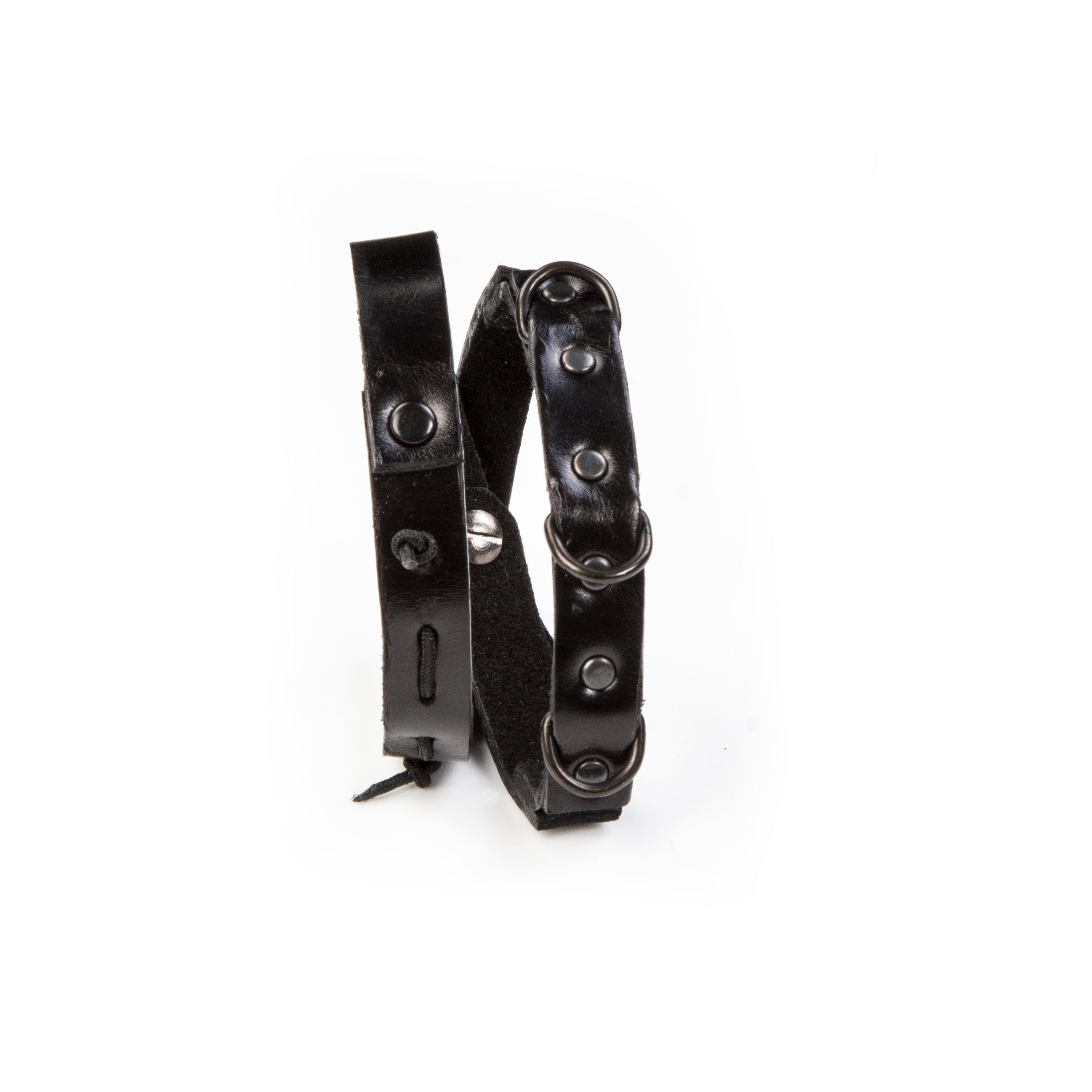 Men's black leather double wrap bracelet featuring gunmetal rivets, industrial rings, and handcrafted layered leather design.