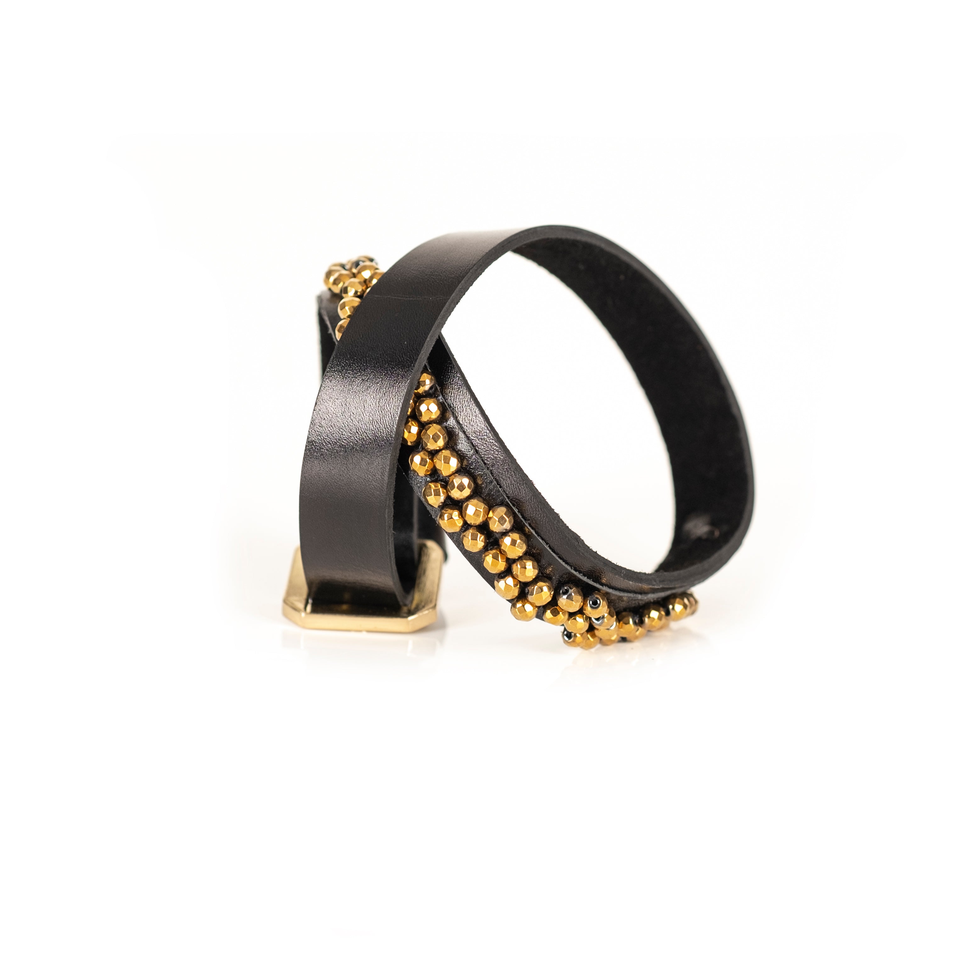 Black leather bracelet with gold bead trim and geometric metal accents, handmade statement bracelet by THE DARK
