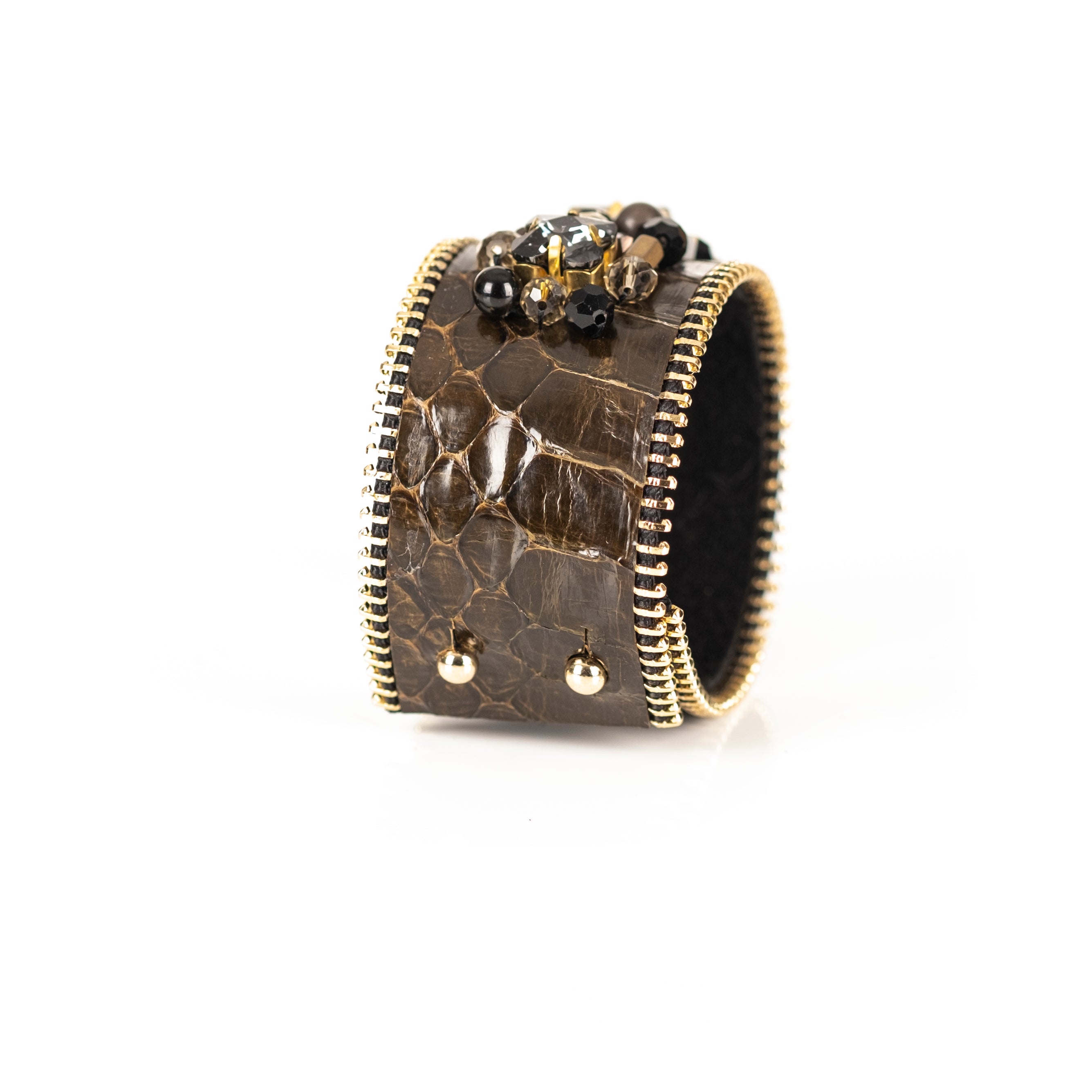 Brown python leather cuff bracelet with smoky crystal centerpiece and gold black bead embellishments, handmade statement bracelet by THE DARK
