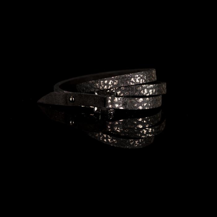 Black textured leather wrap bracelet with layered thin straps and metallic speckled finish, handmade minimalist cuff bracelet for women by THE DARK
