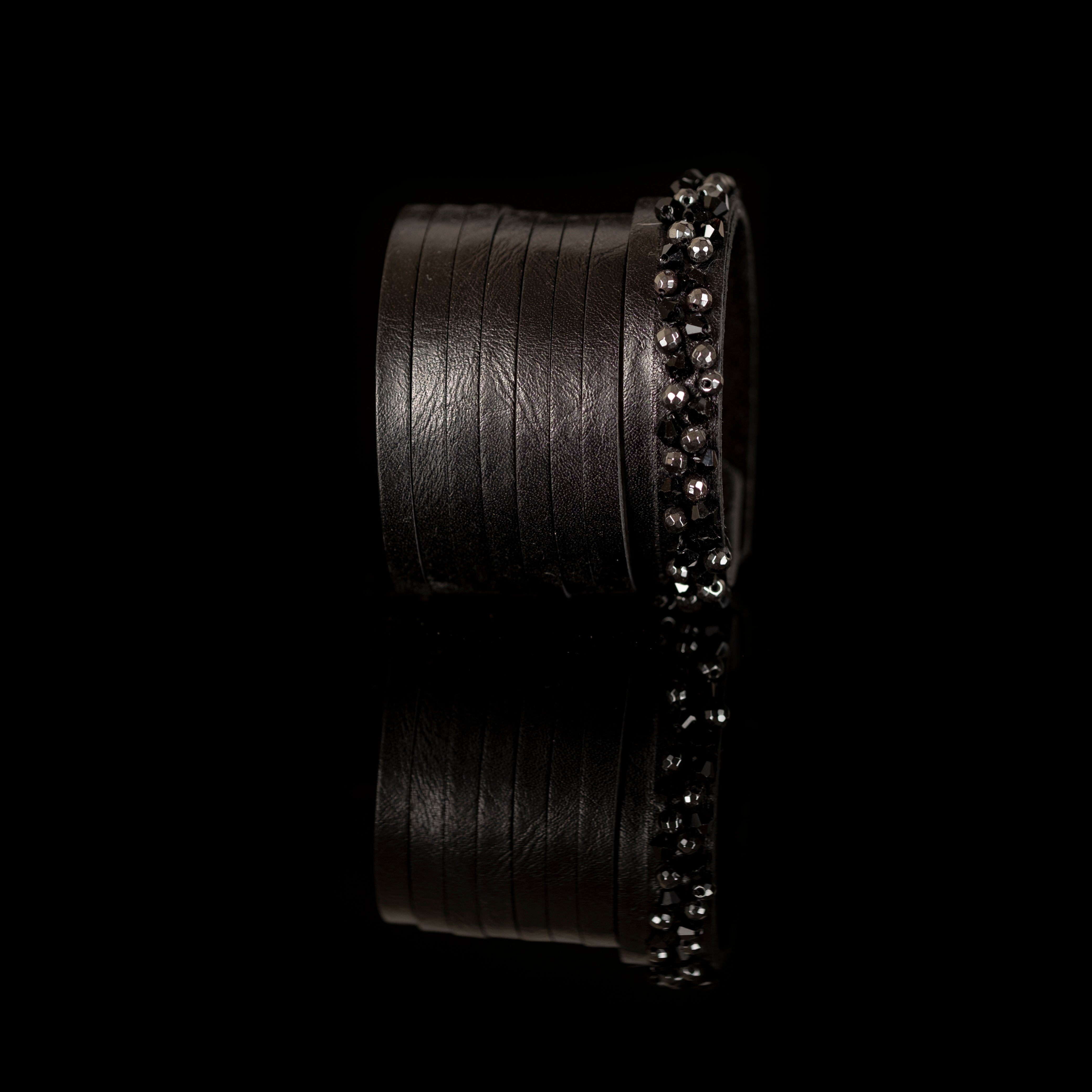 Layered black leather cuff bracelet with faceted crystal edge detailing, handmade statement bracelet by THE DARK