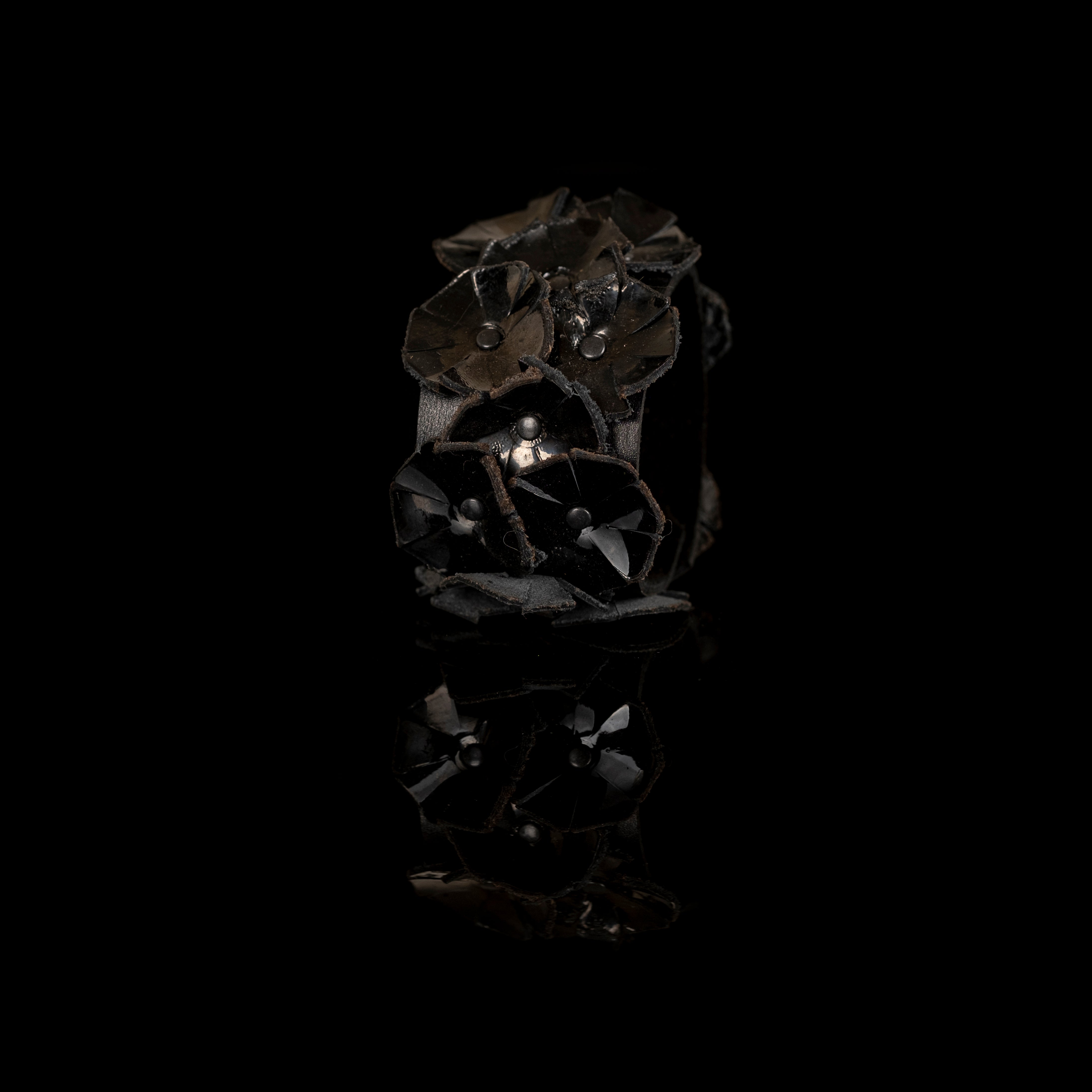 Black leather bracelet with sculptural floral elements, handmade avant-garde leather statement cuff by THE DARK