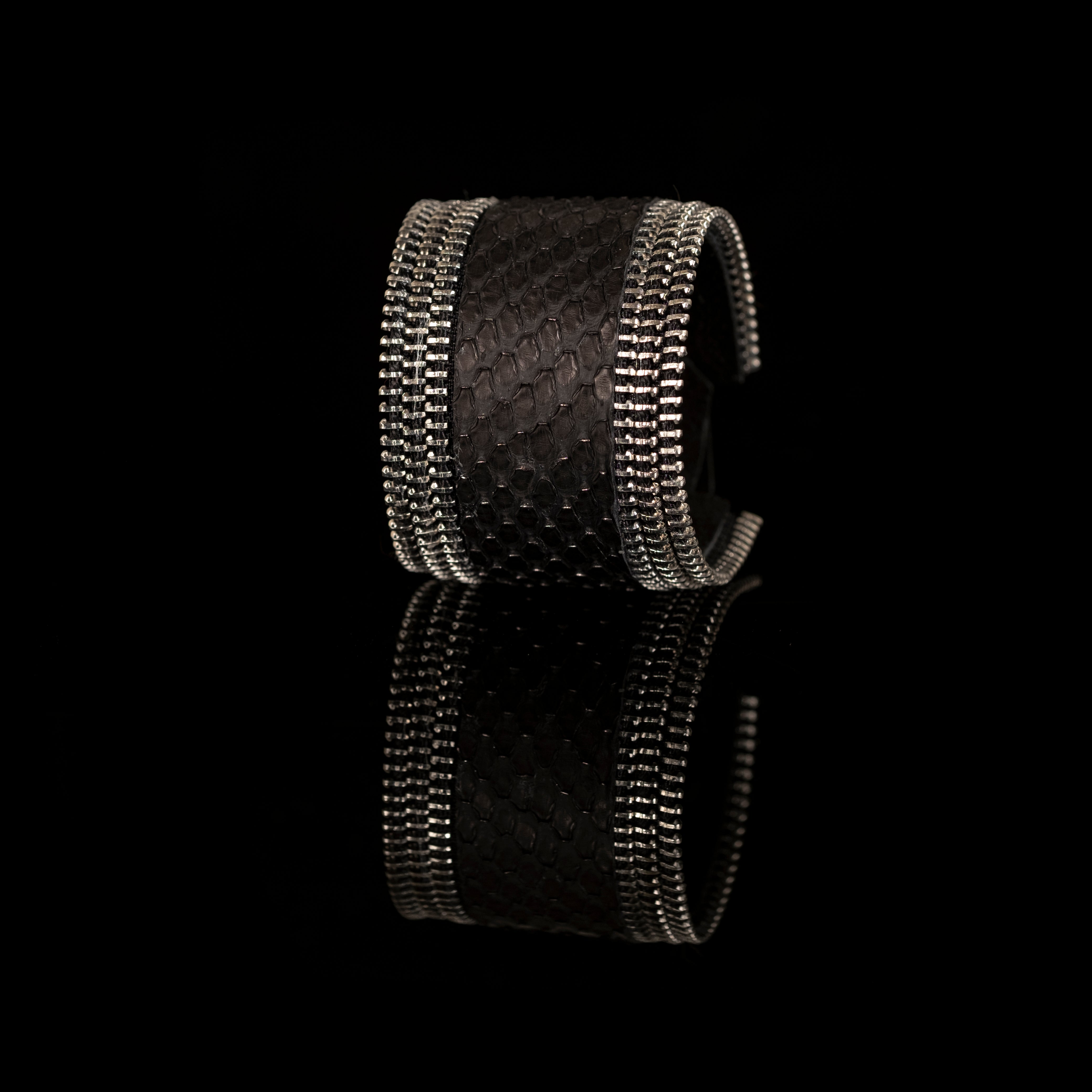 Black python leather cuff bracelet with metallic zipper edges, handmade exotic statement bracelet by THE DARK