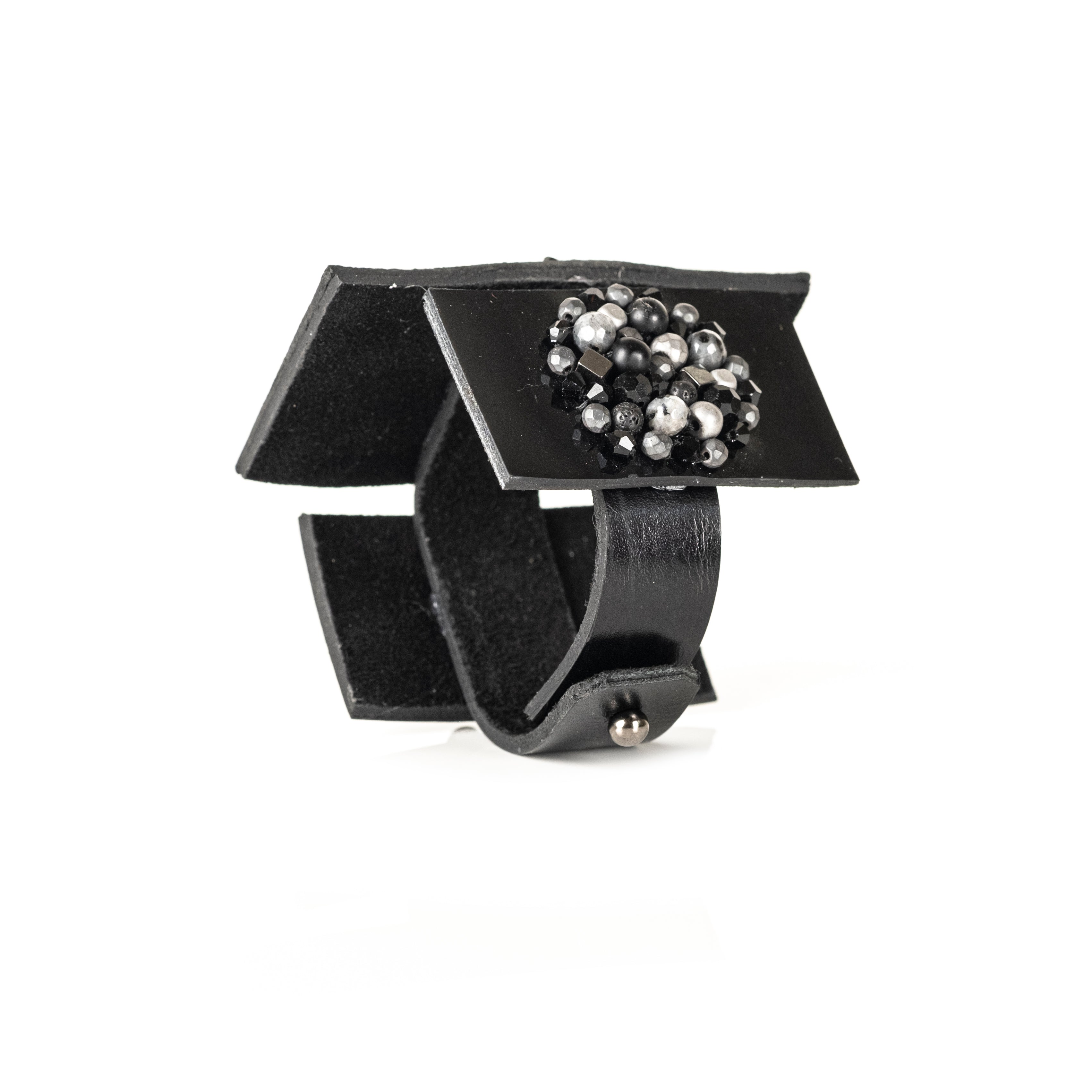 Black leather architectural cuff with circular bead clusters, handmade sculptural statement bracelet by THE DARK