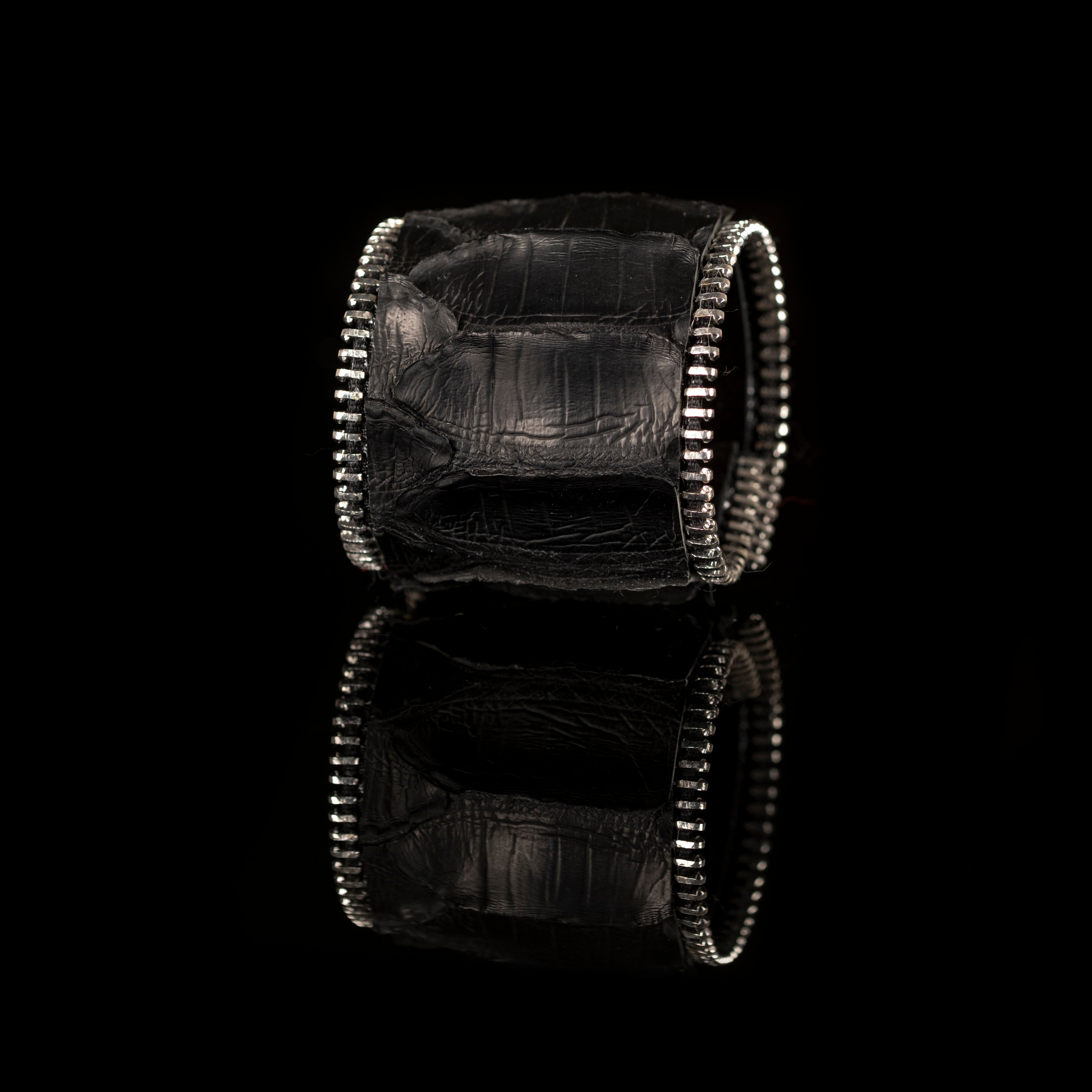Black crocodile texture leather cuff bracelet with metal zipper edges, handmade luxury statement bracelet by THE DARK
