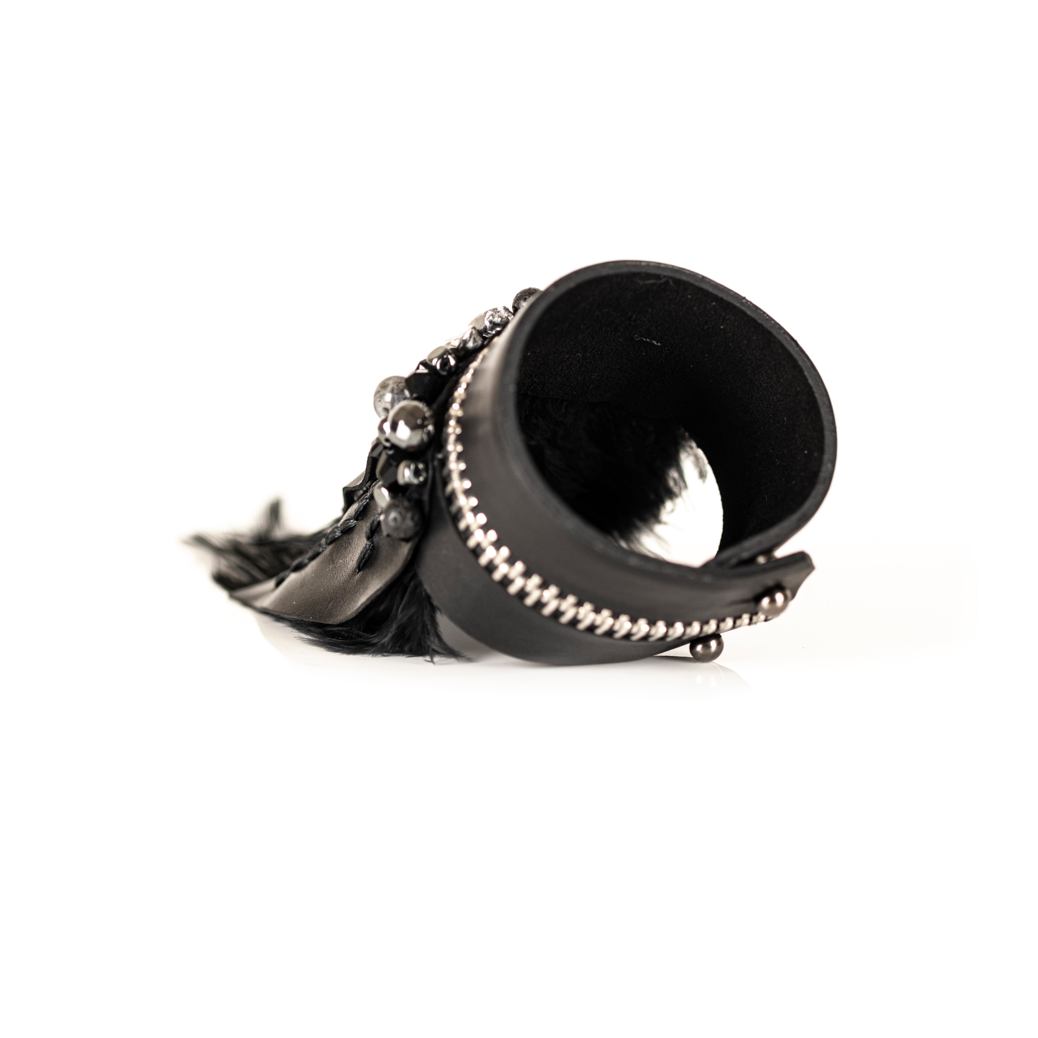 Black leather feather bracelet with crystals and zipper edge detail, handmade avant-garde statement bracelet by THE DARK