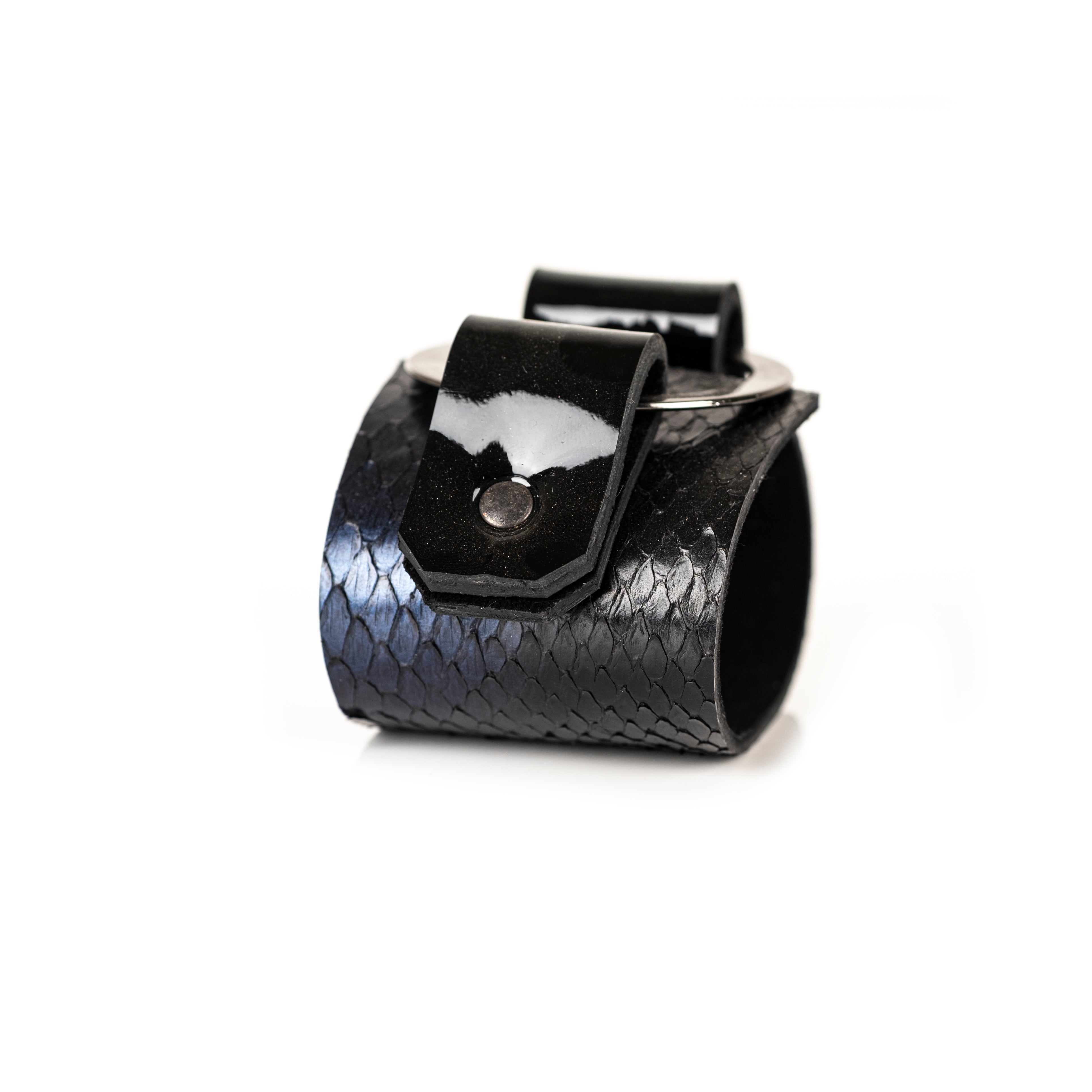 Black python leather cuff bracelet with metal halo ring and glossy leather straps, handmade statement cuff by THE DARK