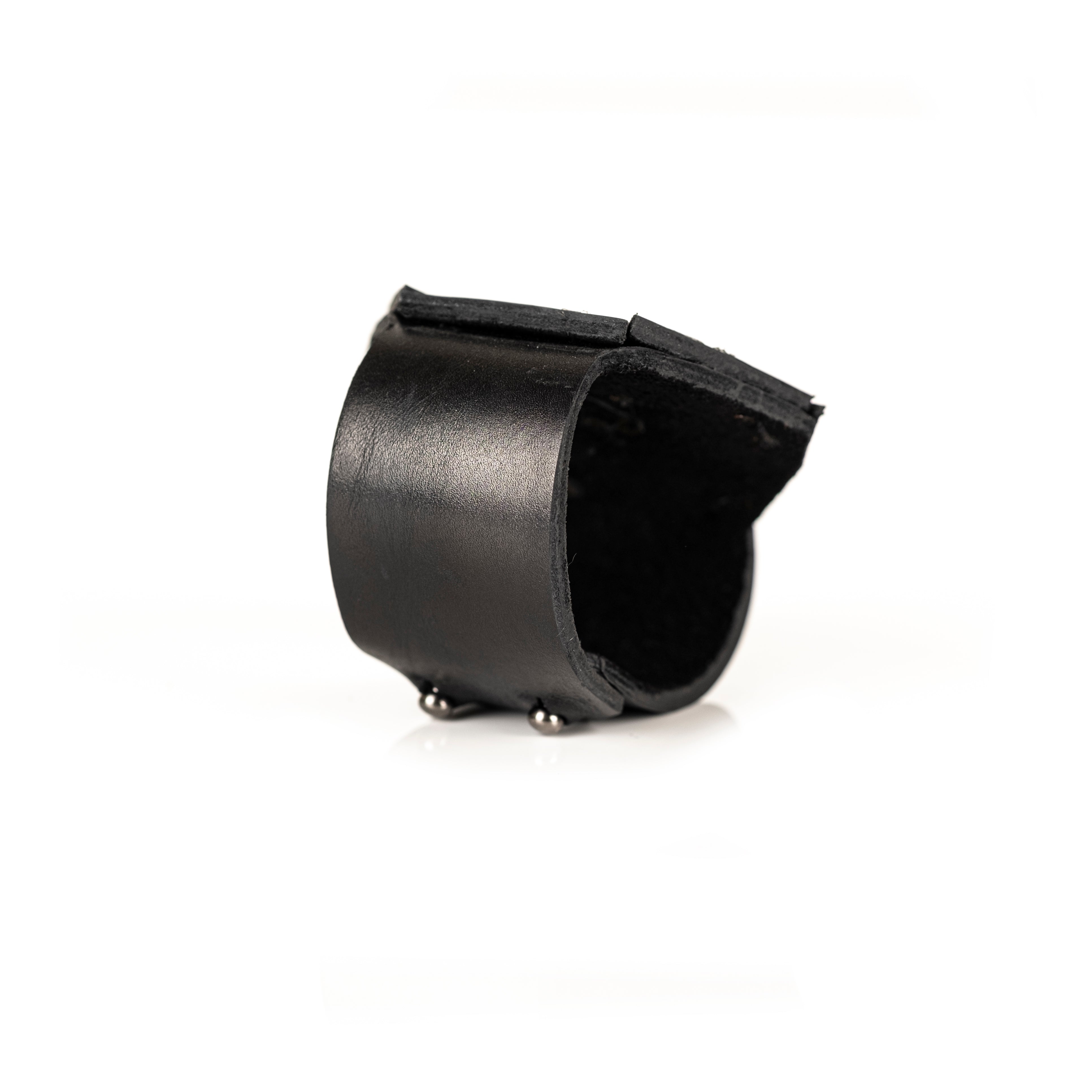 Black geometric leather cuff with hexagon armor structure, handmade architectural statement bracelet by THE DARK
