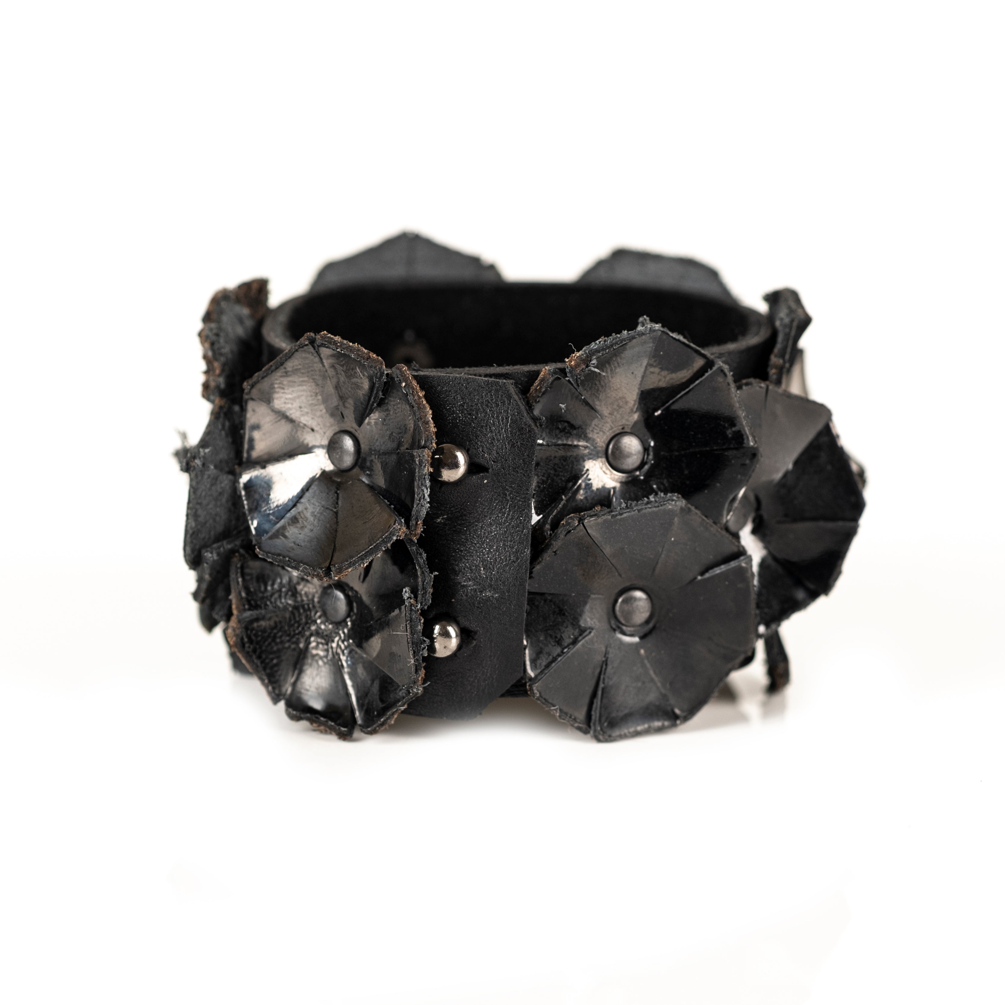 Black leather bracelet with sculptural floral elements, handmade avant-garde leather statement cuff by THE DARK