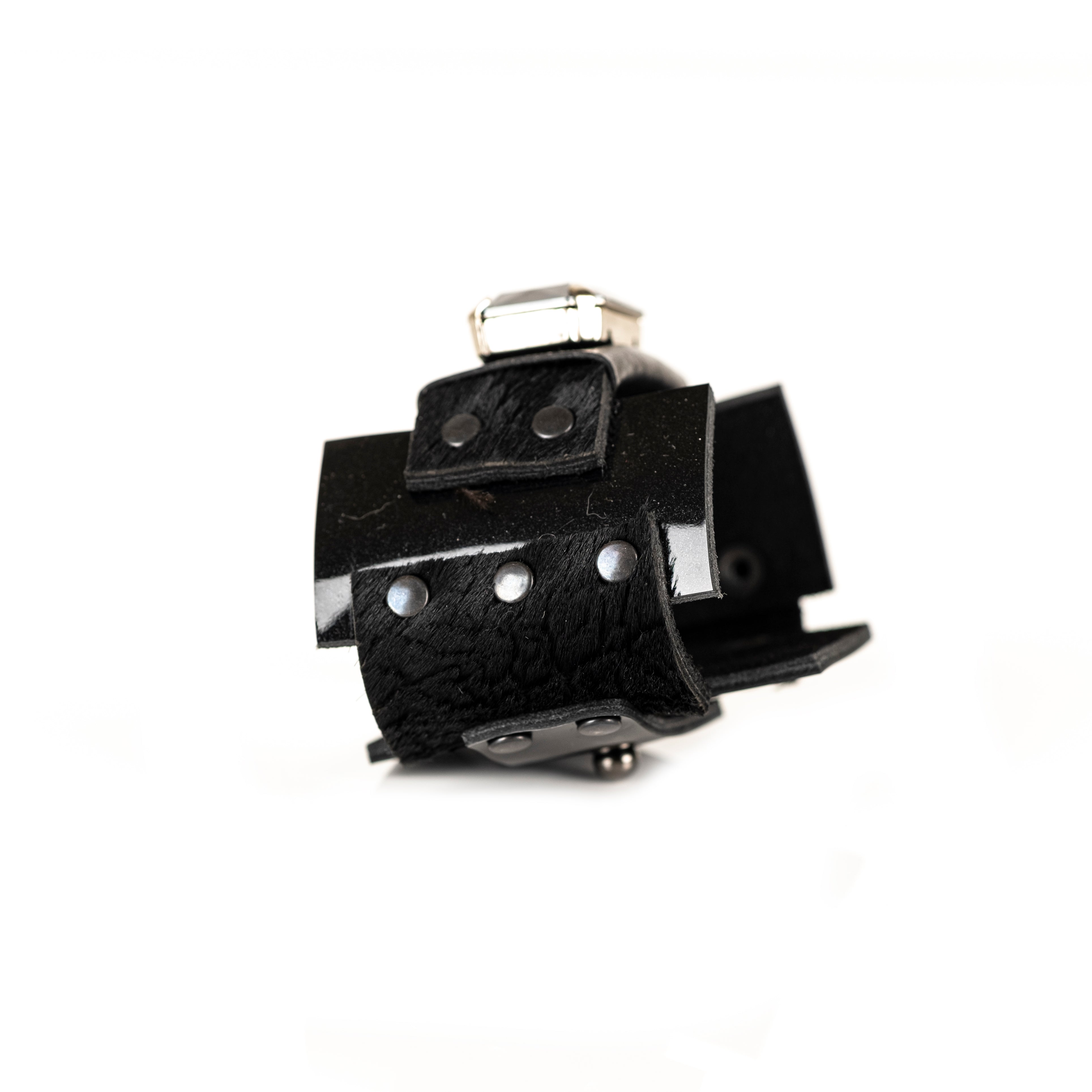 Black leather statement cuff bracelet with large faceted crystal and layered leather panels, handmade bracelet by THE DARK