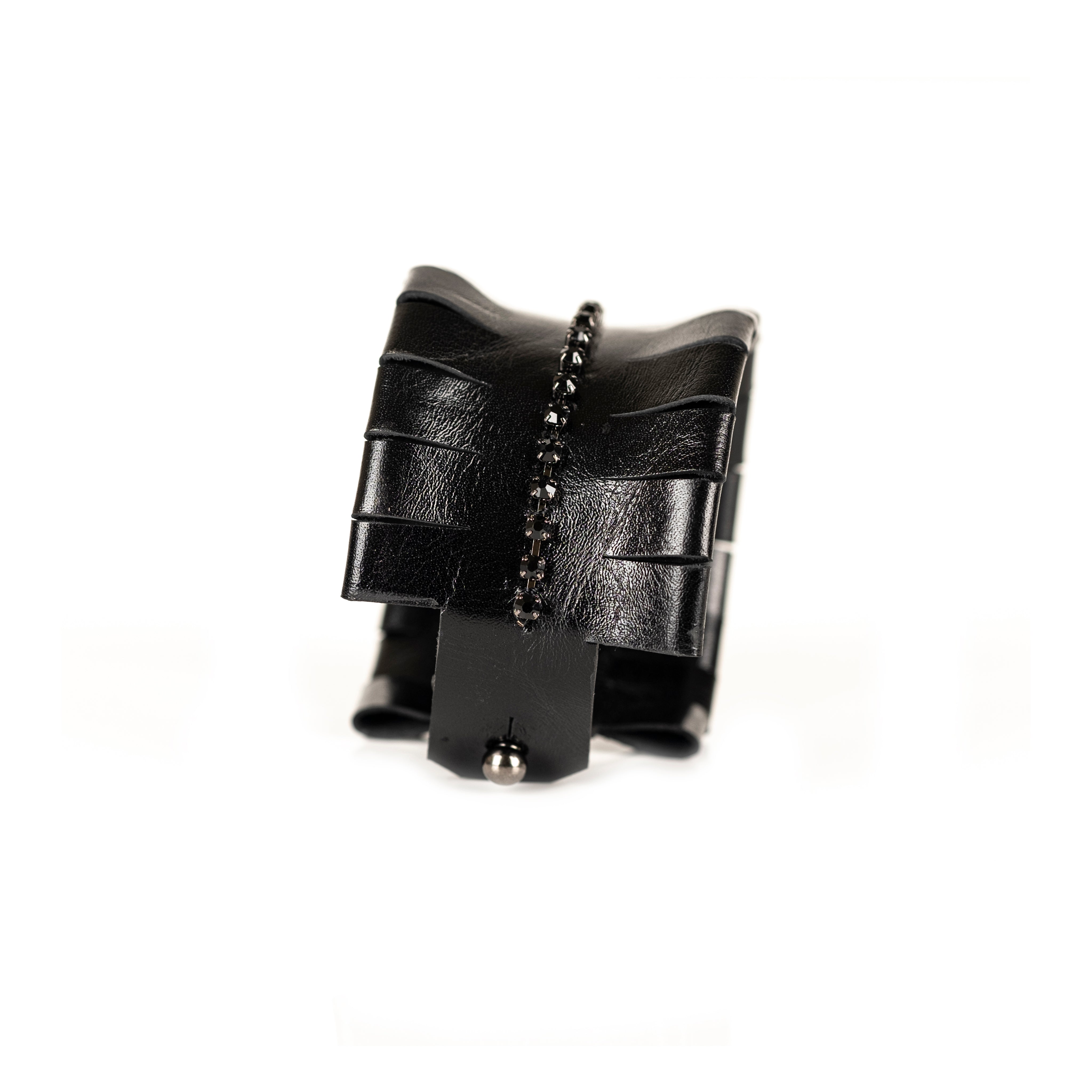 Black patent leather cuff bracelet with central black crystal chain, handmade statement leather bracelet by THE DARK