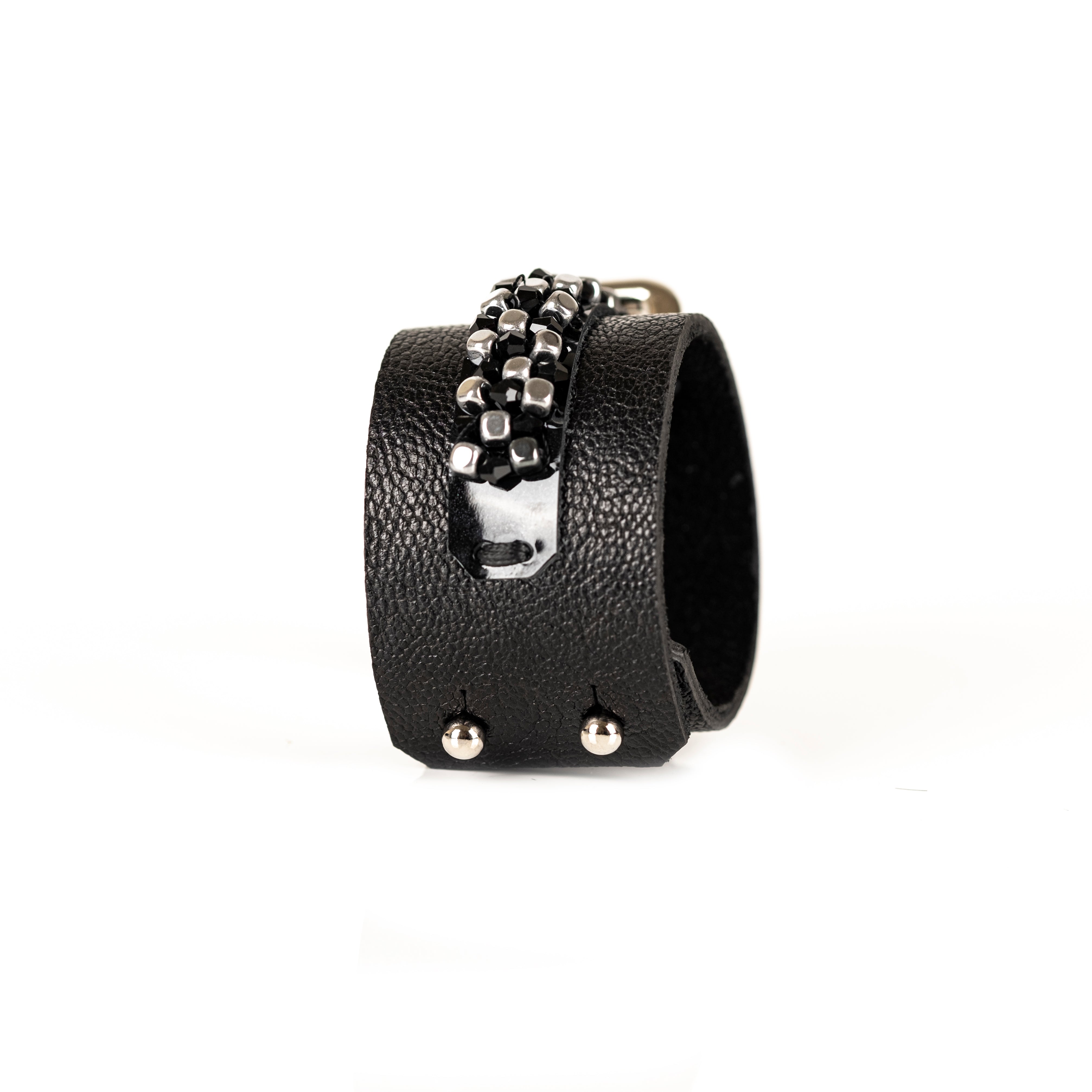 Black leather cuff bracelet with central grid of black crystals and silver beads, handmade statement bracelet by THE DARK