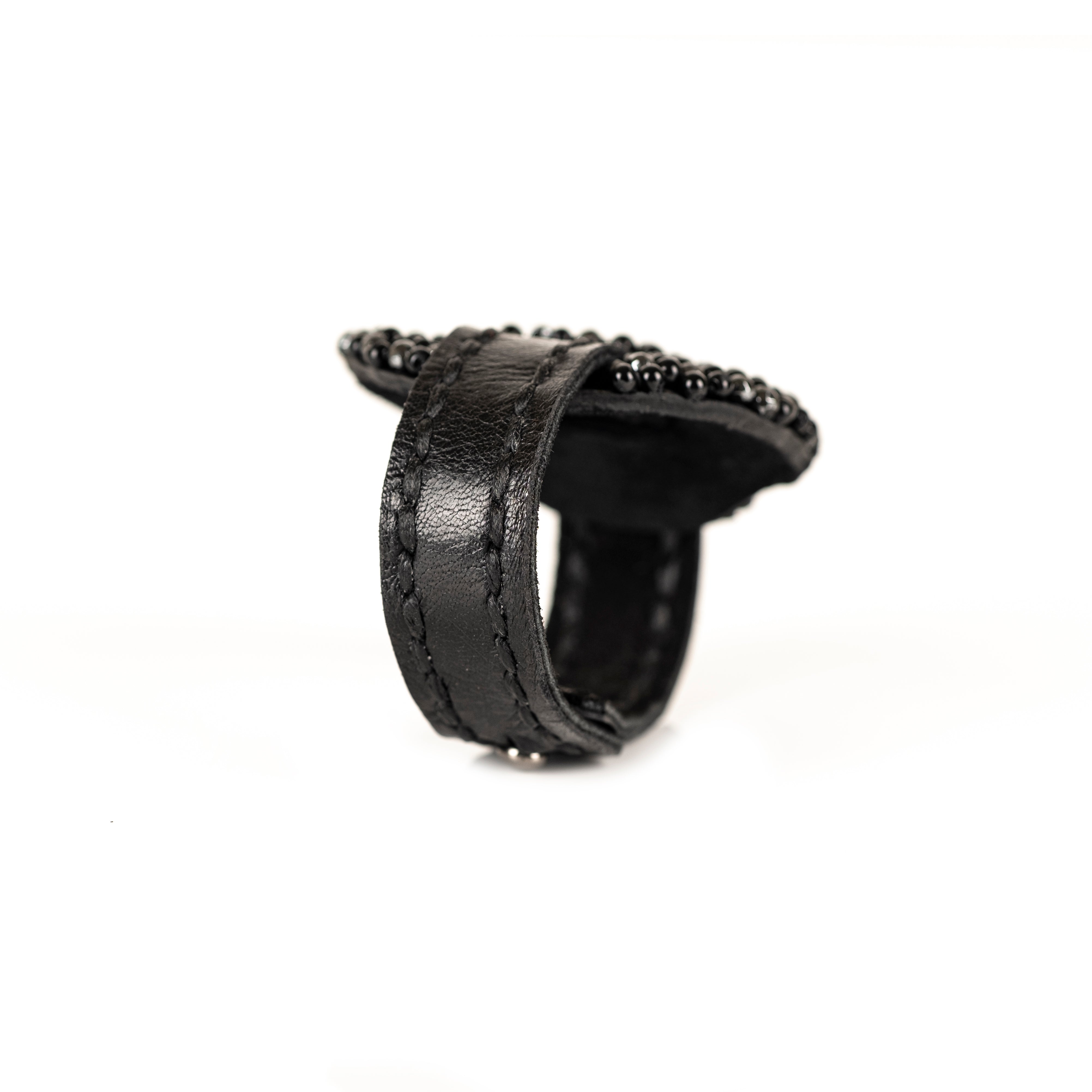 Black leather bracelet with dense cluster of black beads and crystals, handmade statement bracelet by THE DARK