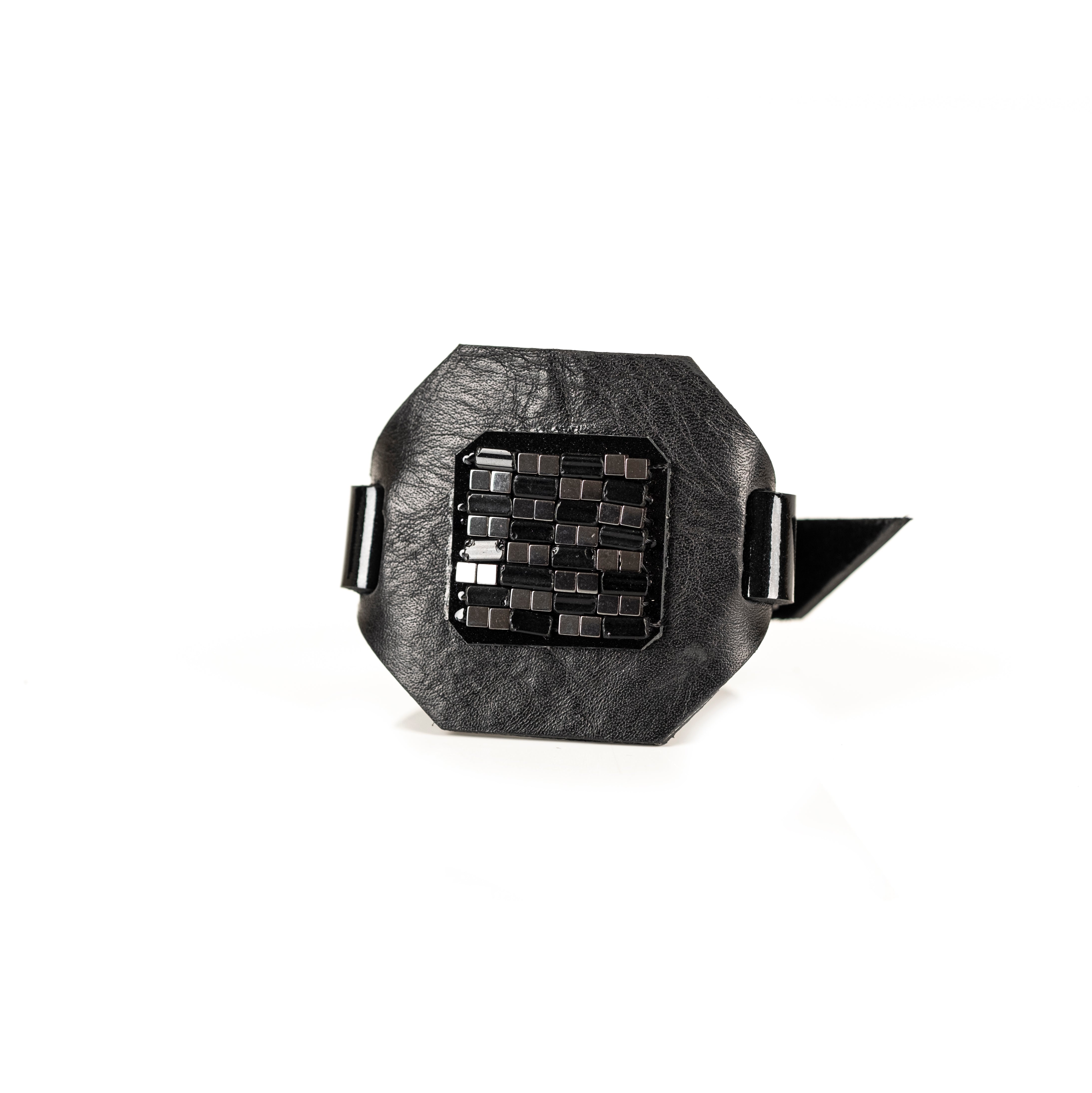 Black leather statement bracelet with geometric metal grid centerpiece, handmade dark fashion cuff by THE DARK