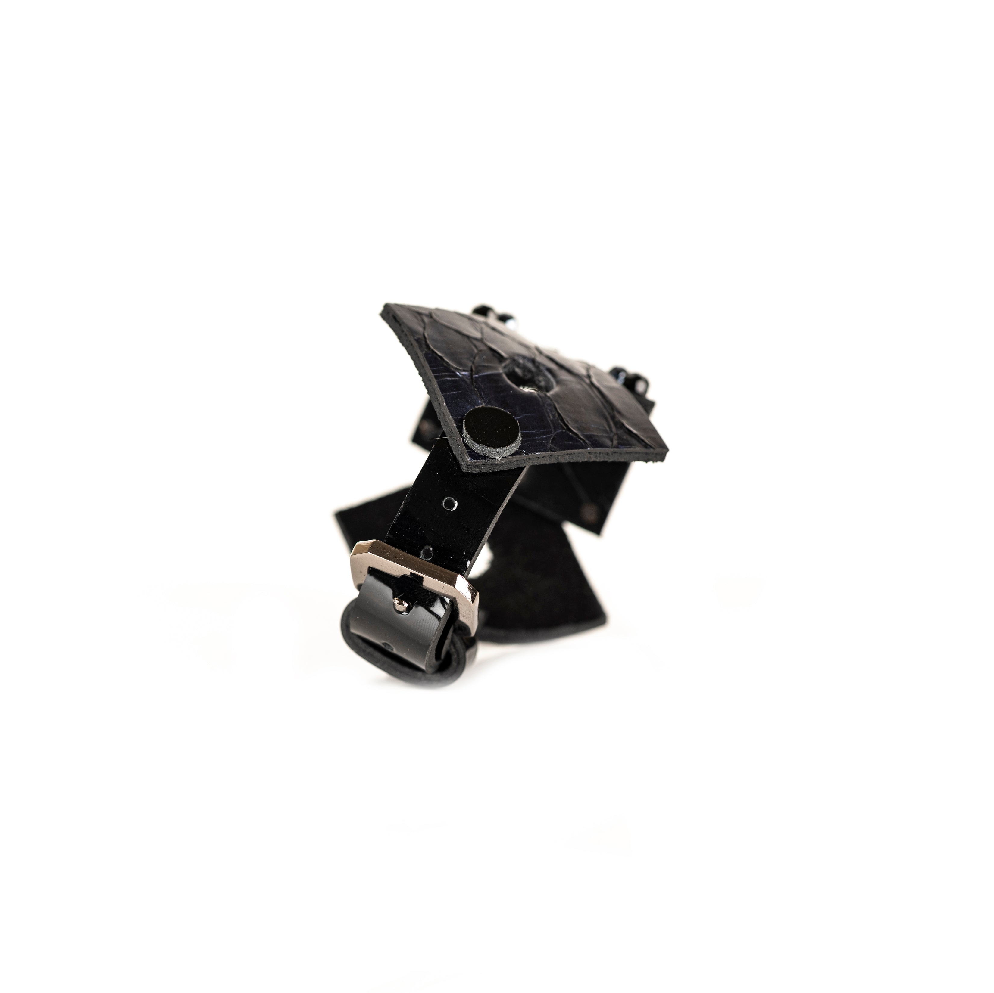 Black sculptural leather bracelet with faceted black crystal bead flower and python leather accents, handmade statement cuff by THE DARK