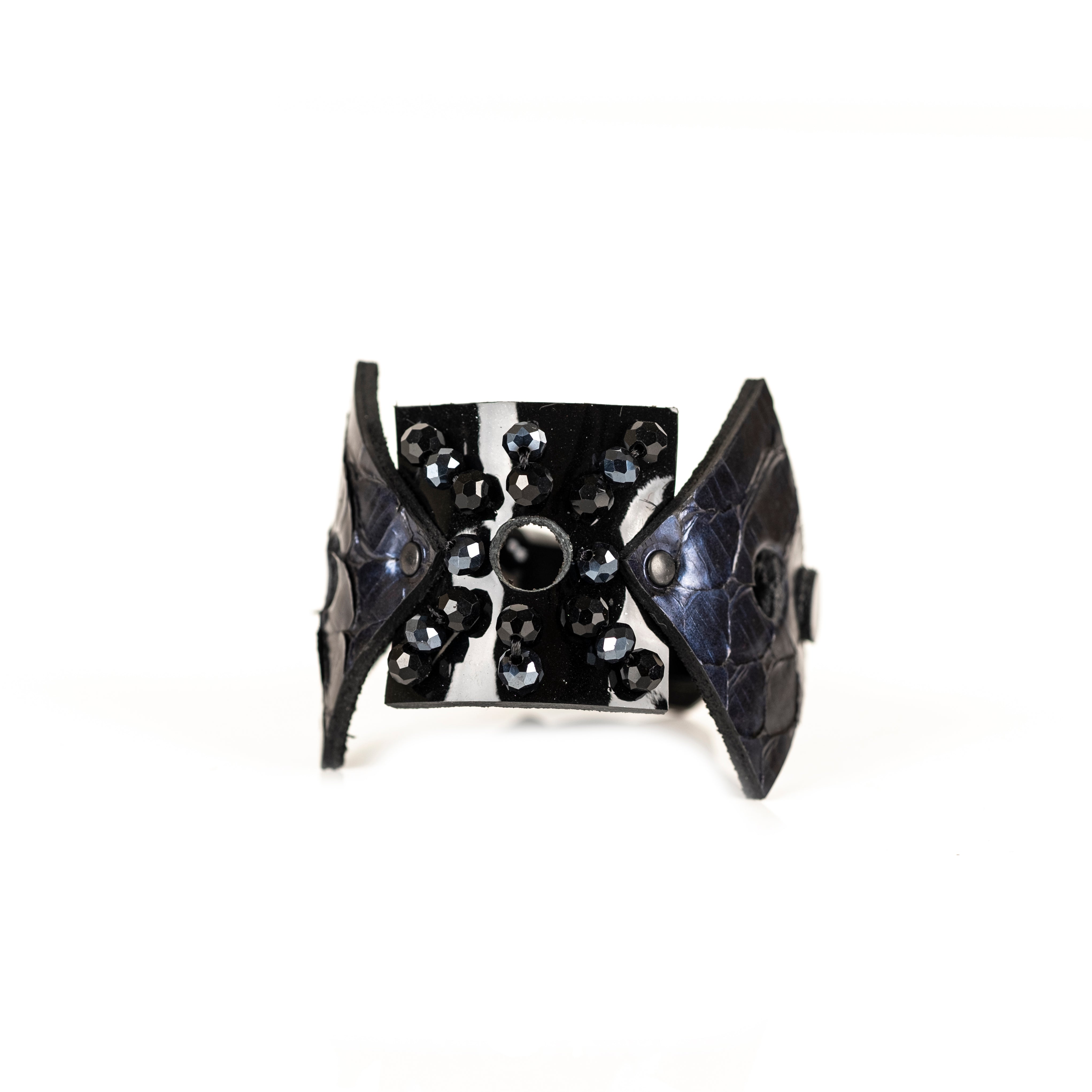 Black sculptural leather bracelet with faceted black crystal bead flower and python leather accents, handmade statement cuff by THE DARK