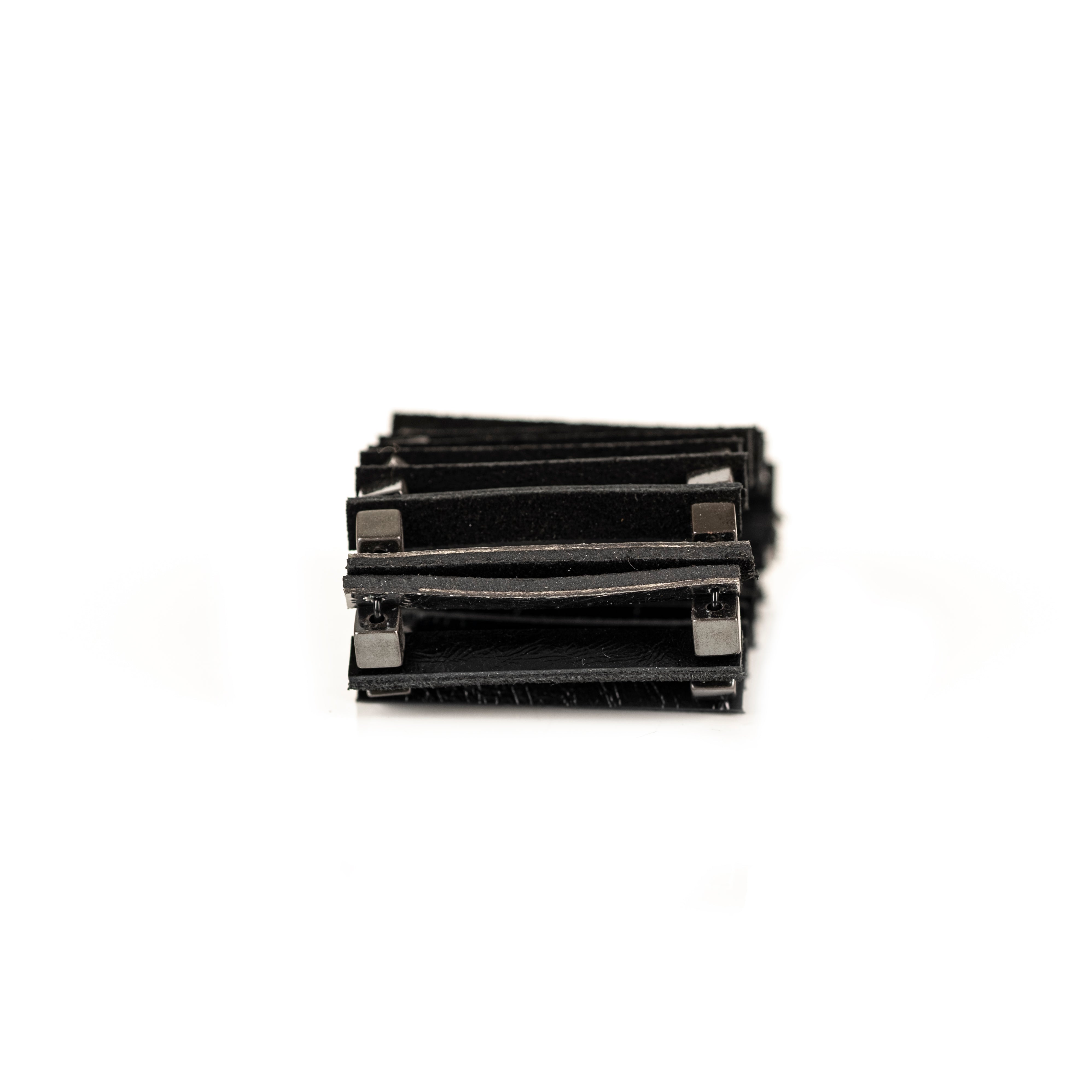 Black leather cage bracelet with vertical leather strips and metal frame structure, handmade architectural cuff by THE DARK