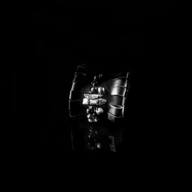 leather bracelet The faint voice