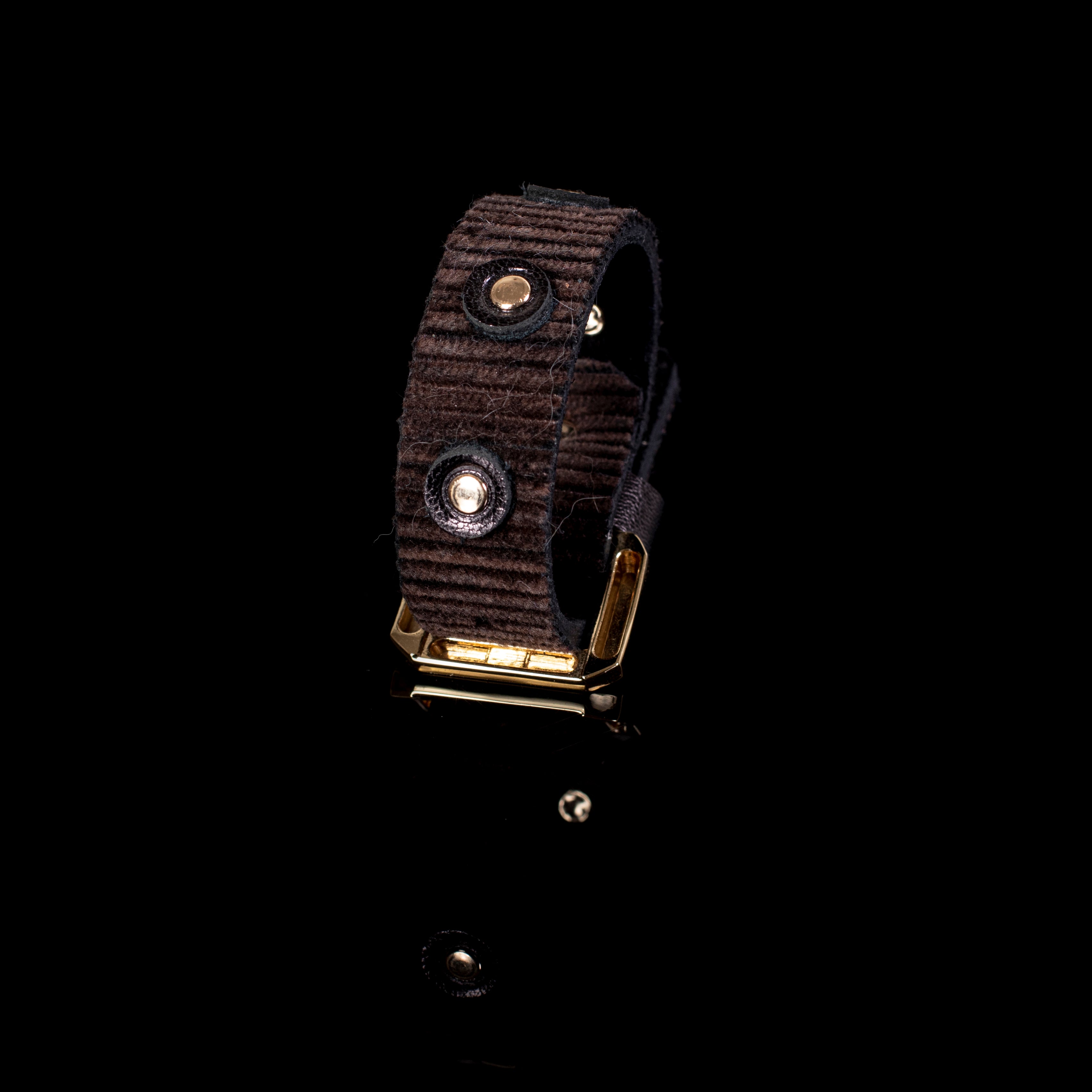 Brown ribbed leather cuff bracelet with gold and crystal stud accents, handcrafted textured wide bracelet for women