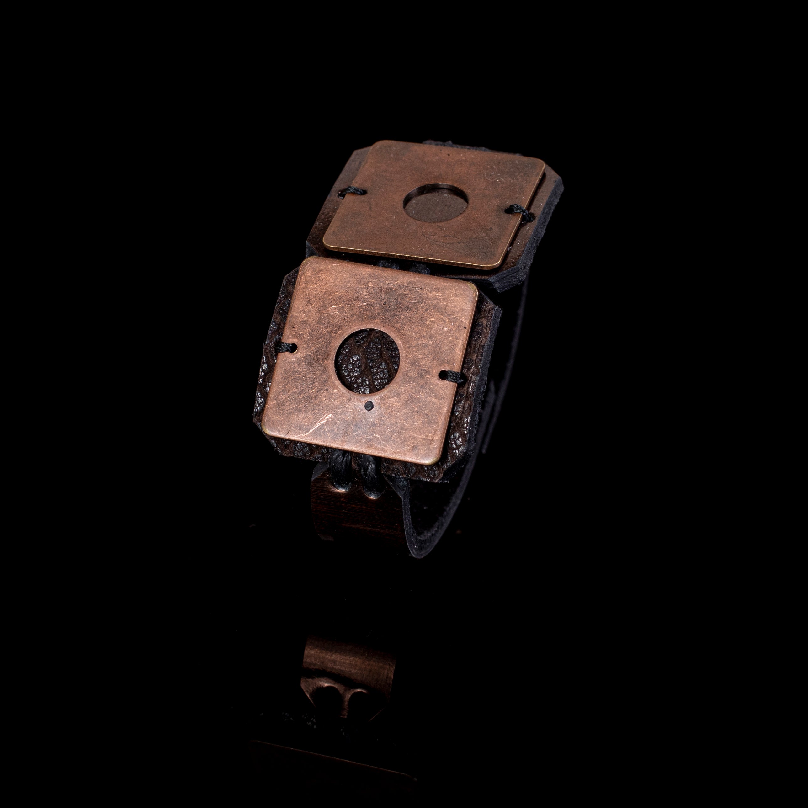 Brown leather cuff bracelet with copper square plates and cutout detail, handcrafted industrial statement bracelet for women