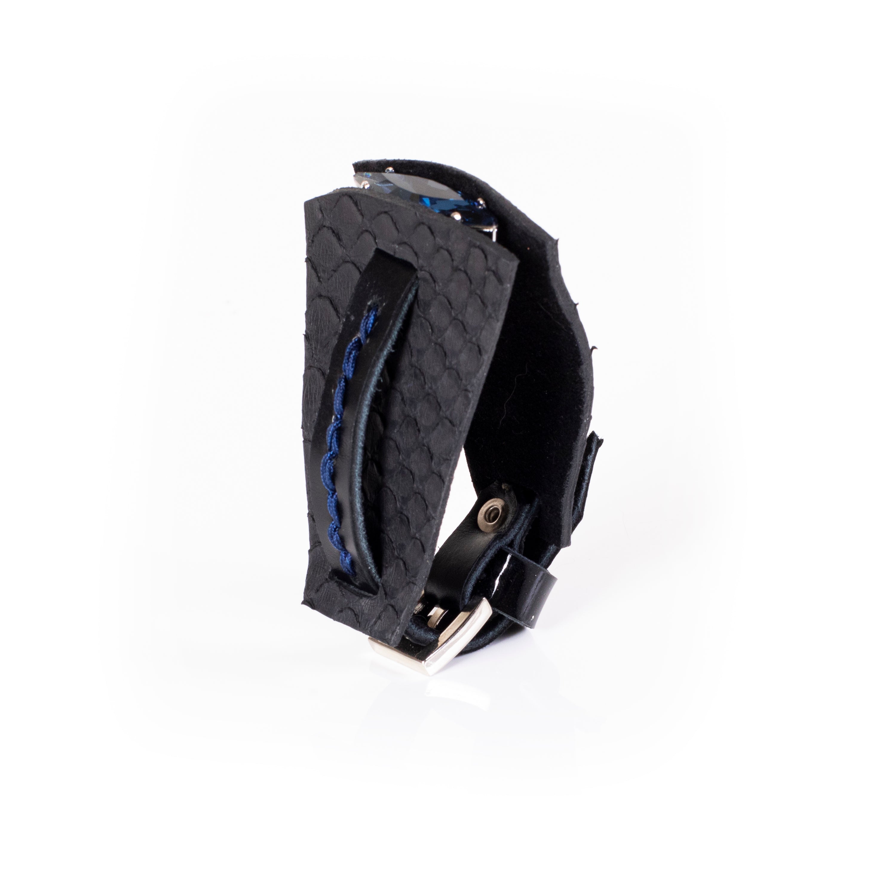 Black textured leather cuff bracelet with sculptural layered design, blue braided detail and crystal accent, handcrafted statement bracelet for women by THE DARK