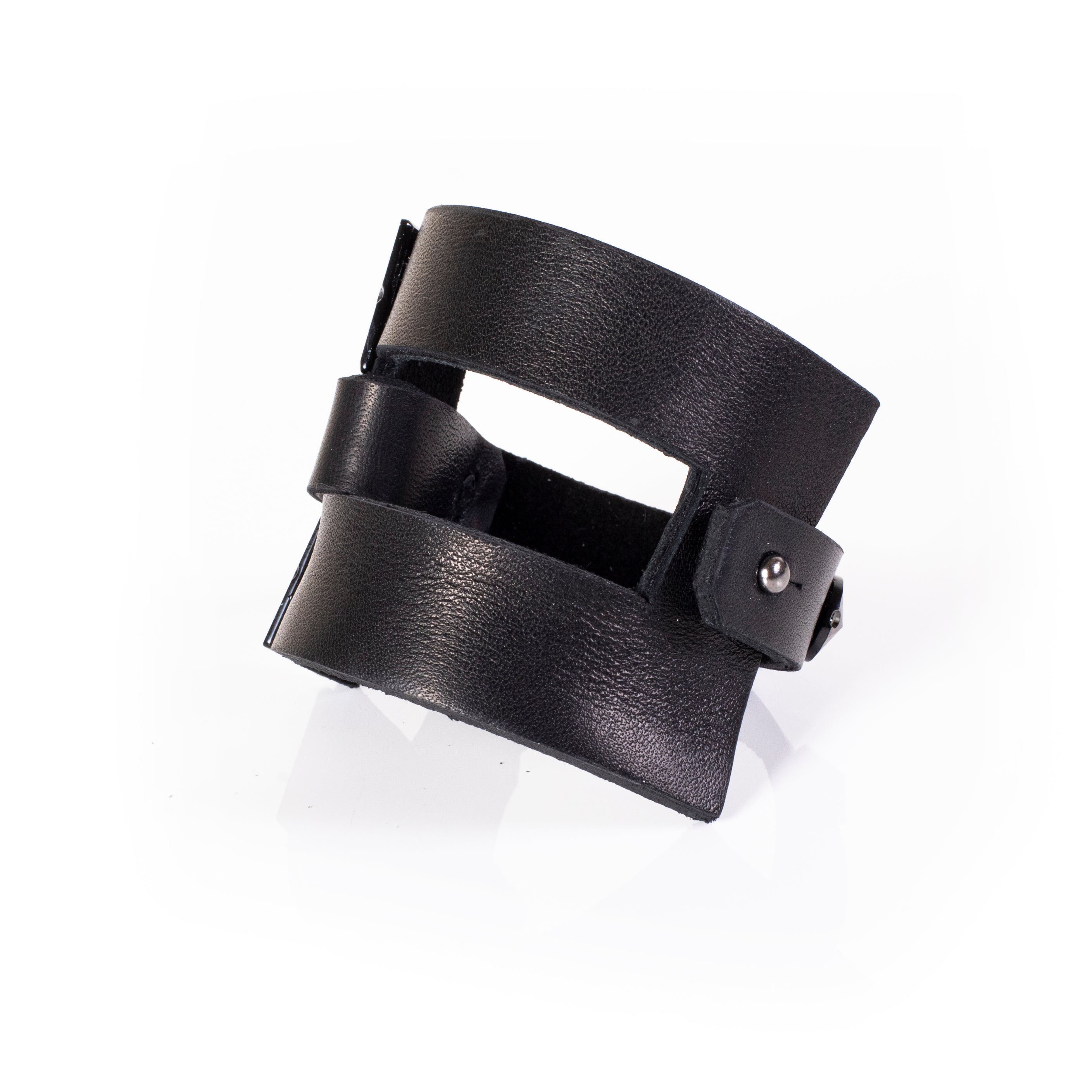 Black leather cuff bracelet with large pyramid studs and double strap design, handcrafted bold statement bracelet for women