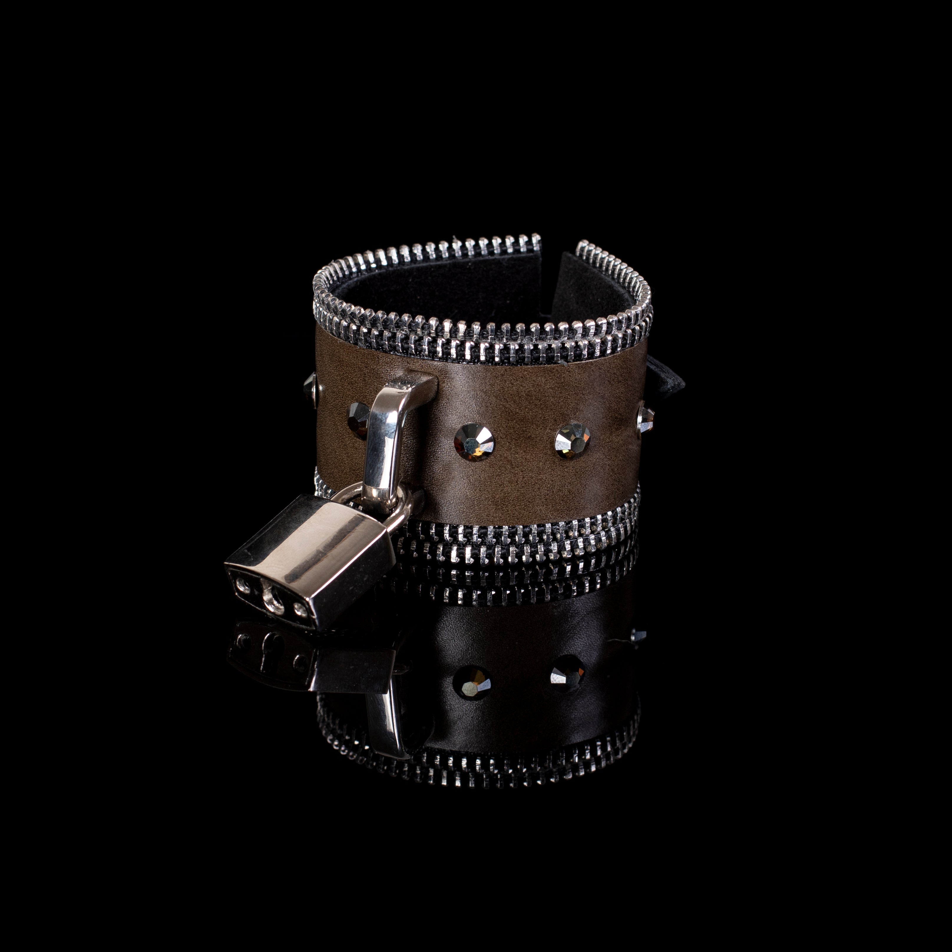 Brown leather cuff bracelet with zipper edges, crystal studs and padlock detail, edgy statement bracelet for women