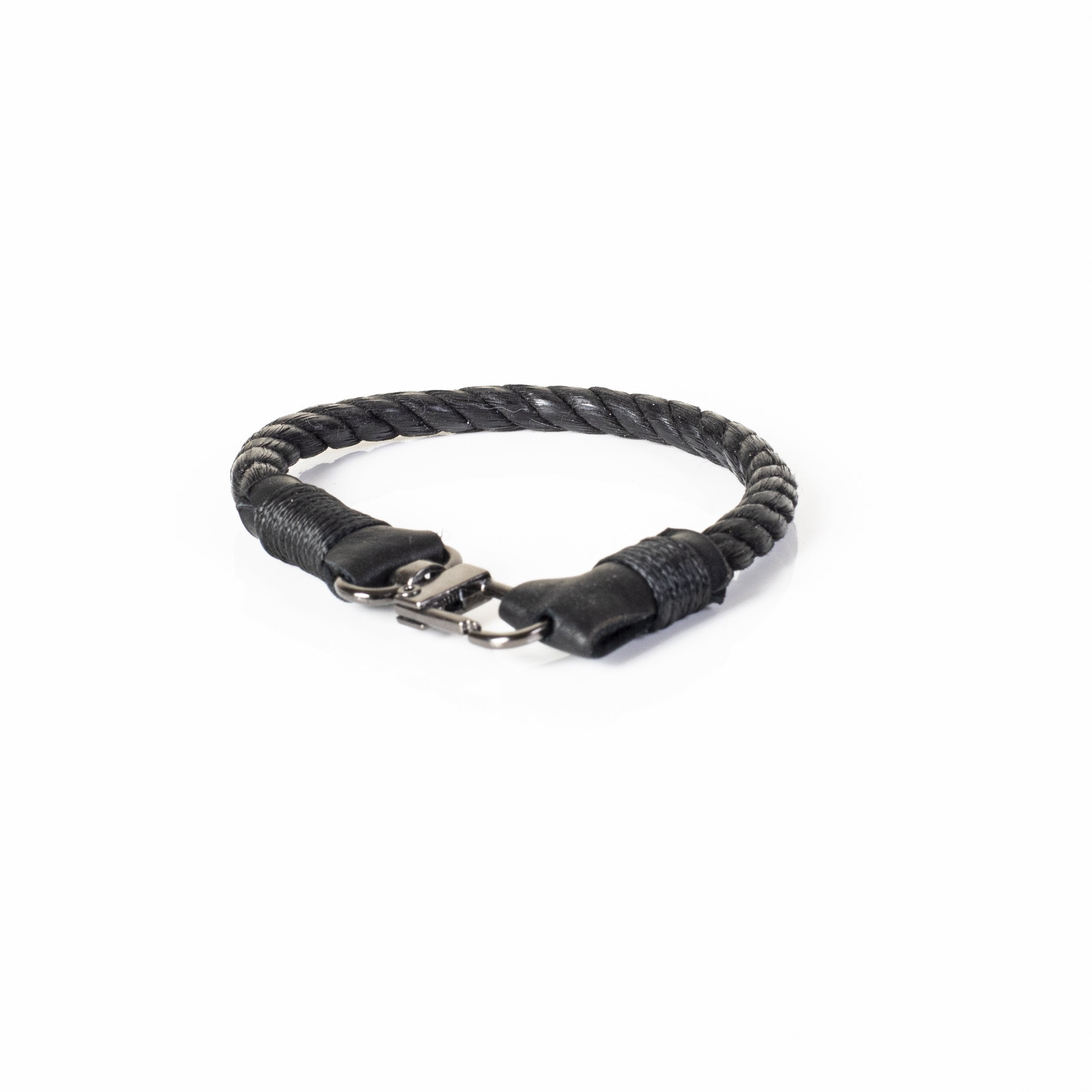 Men's black braided genuine leather bracelet featuring a stainless steel clasp and handcrafted woven design on a white background.