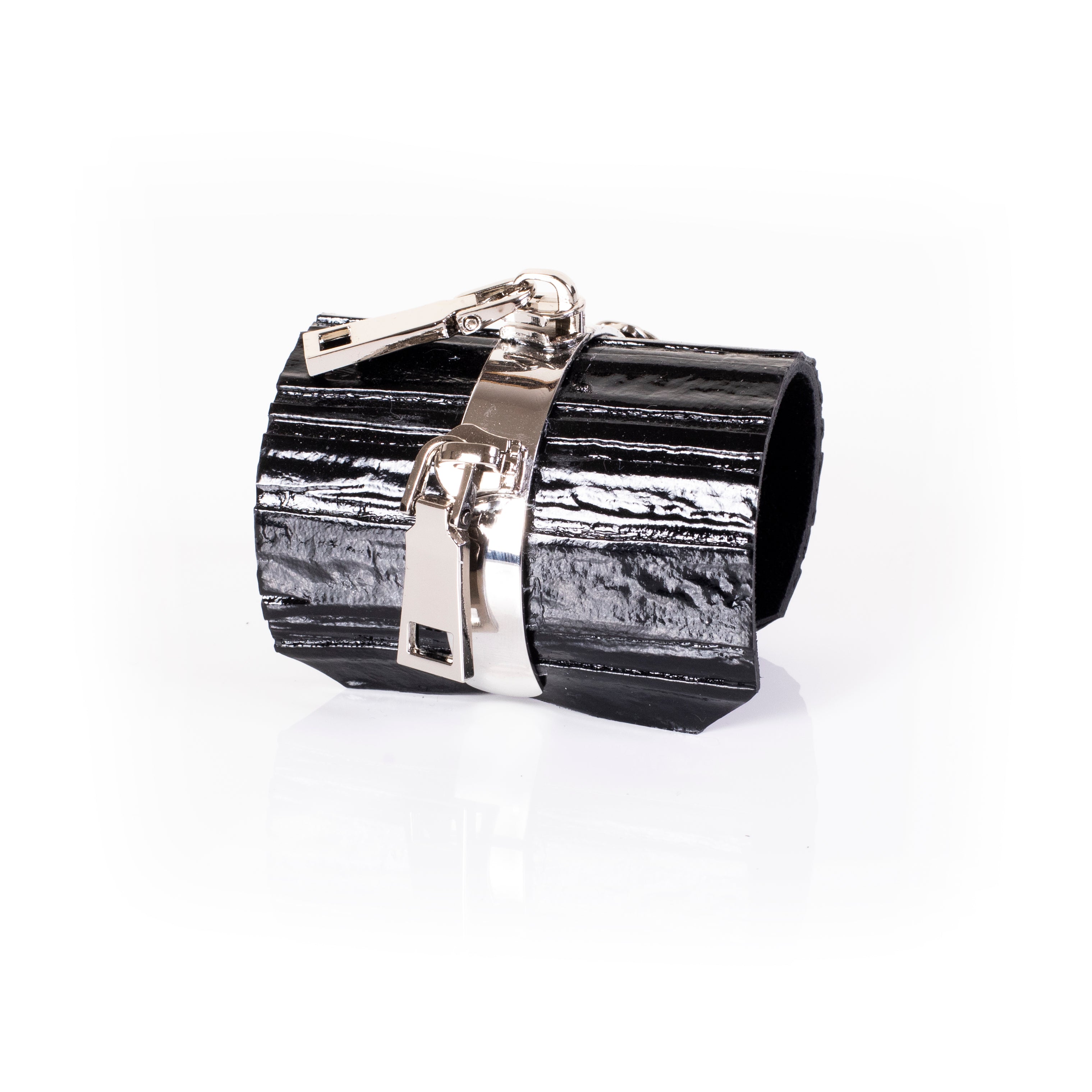 Black patent leather cuff bracelet with silver lock and zipper hardware detail, glossy wide handcrafted statement bracelet for women by THE DARK
