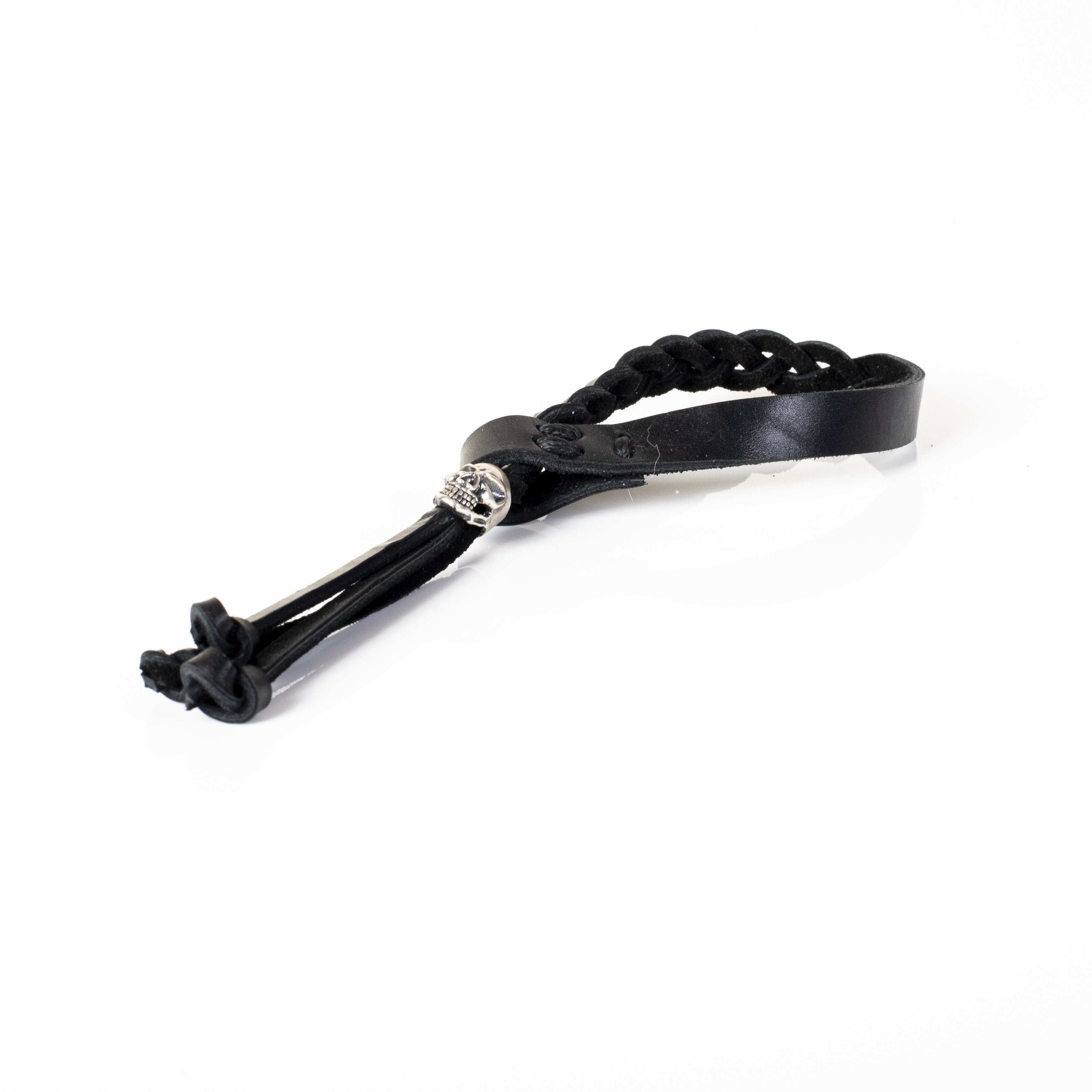 Handmade black braided leather bracelet for men featuring an adjustable sliding closure and silver-tone accent on a white background.