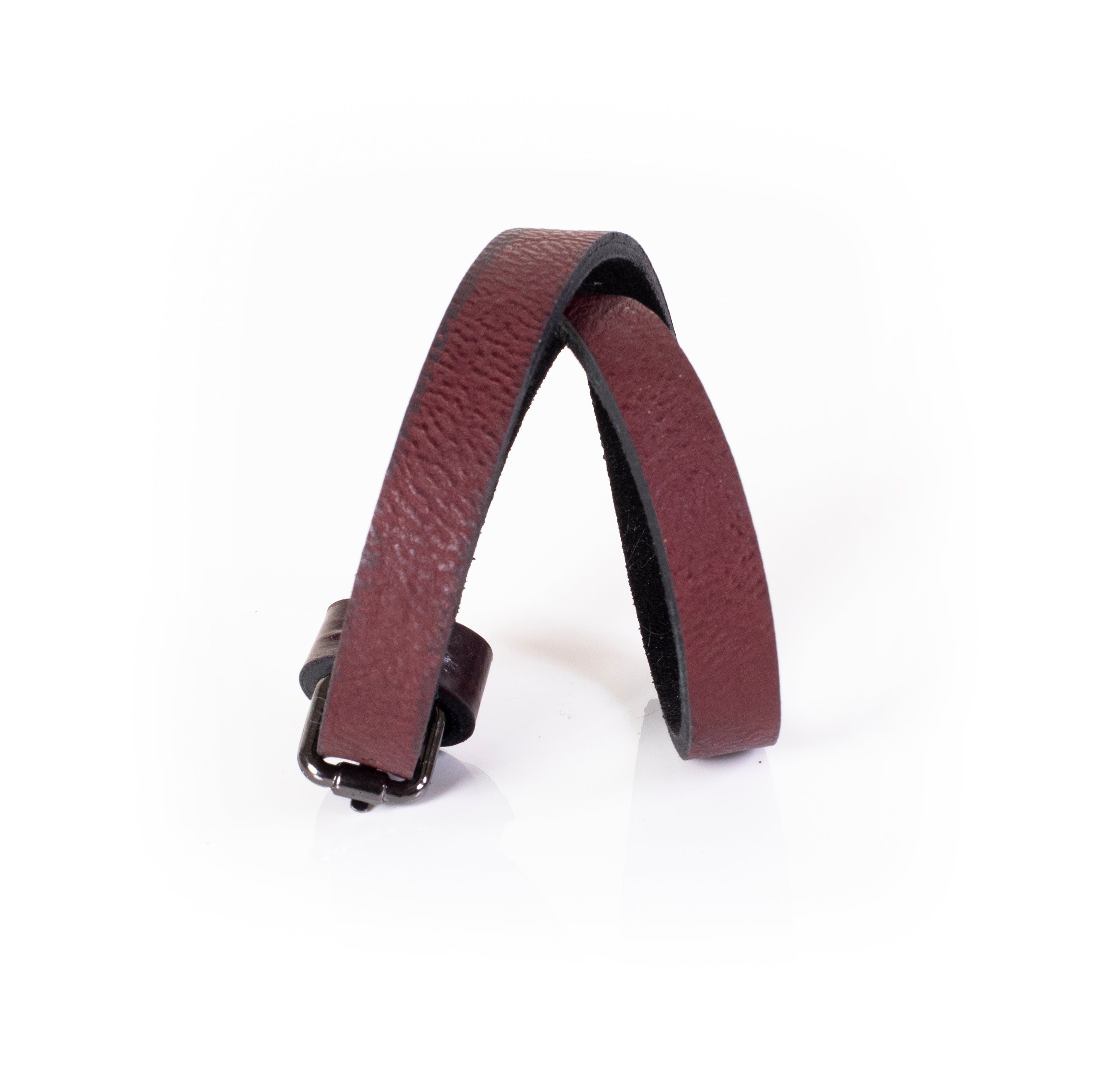 Brown leather cuff bracelet with simple minimalist design and buckle closure, handcrafted slim wristband for women