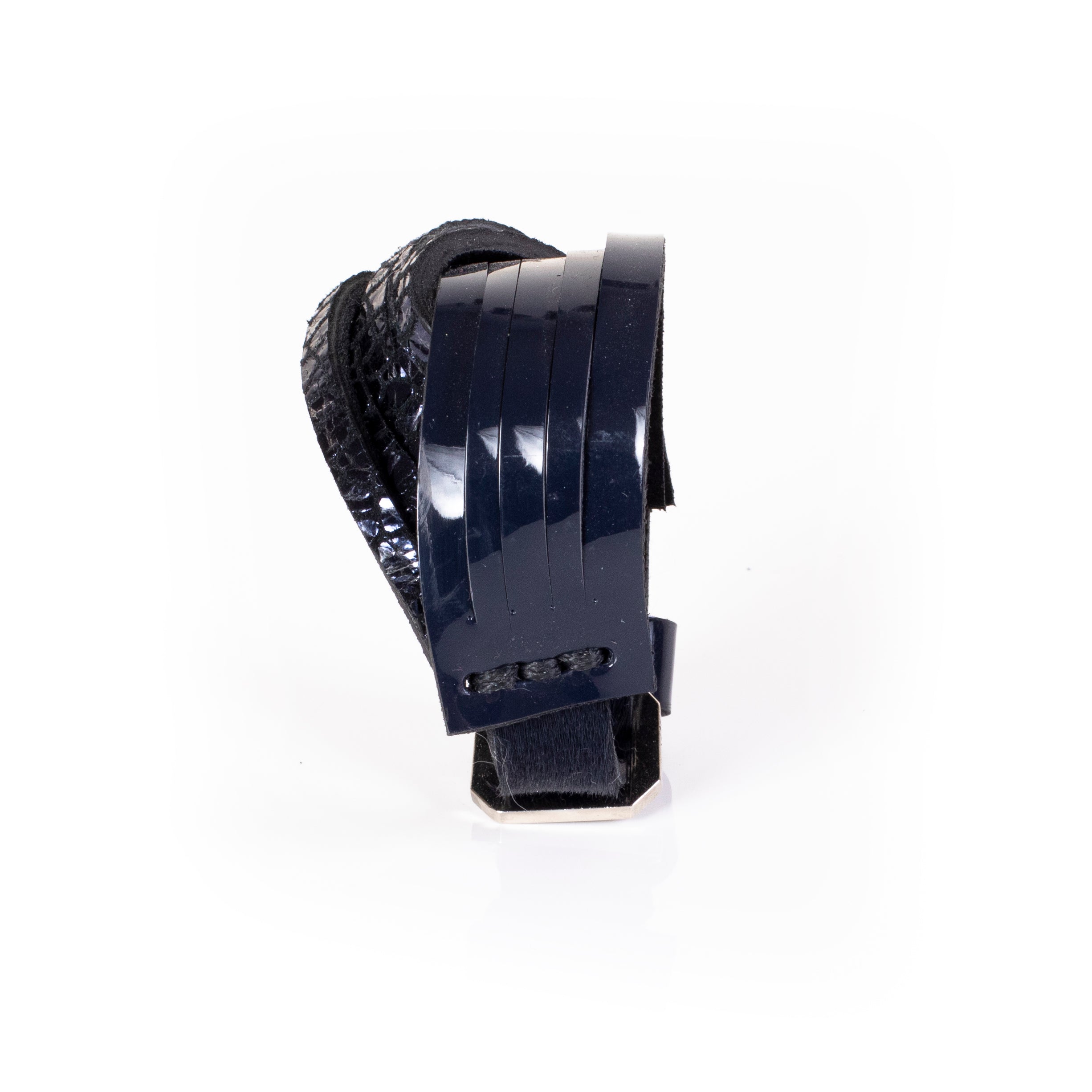 Black patent leather cuff bracelet with glossy linear panel design and layered leather construction, handcrafted wide statement bracelet for women by THE DARK