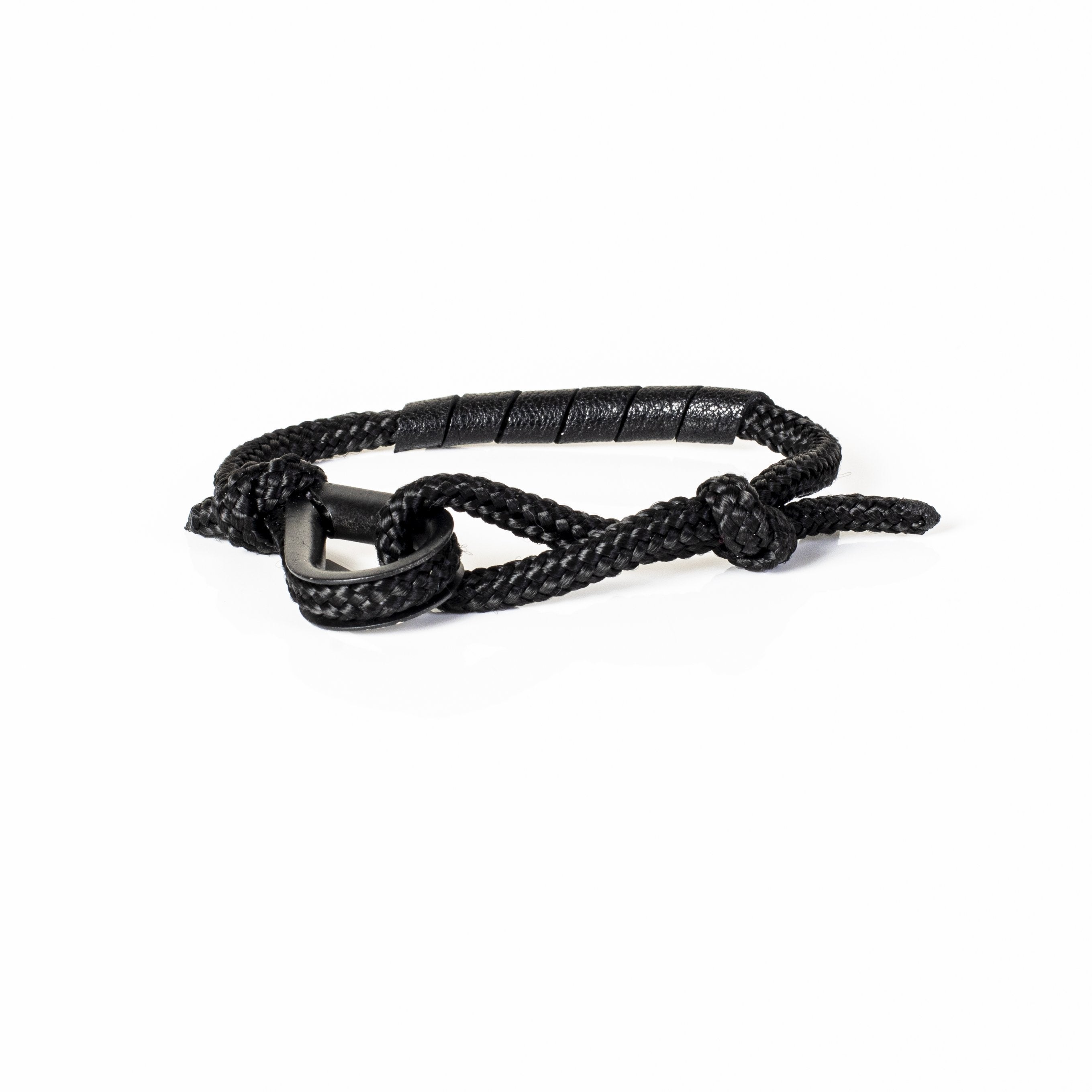 Handmade black rope bracelet featuring black leather accents and a black hook clasp closure in a minimalist nautical-inspired design.