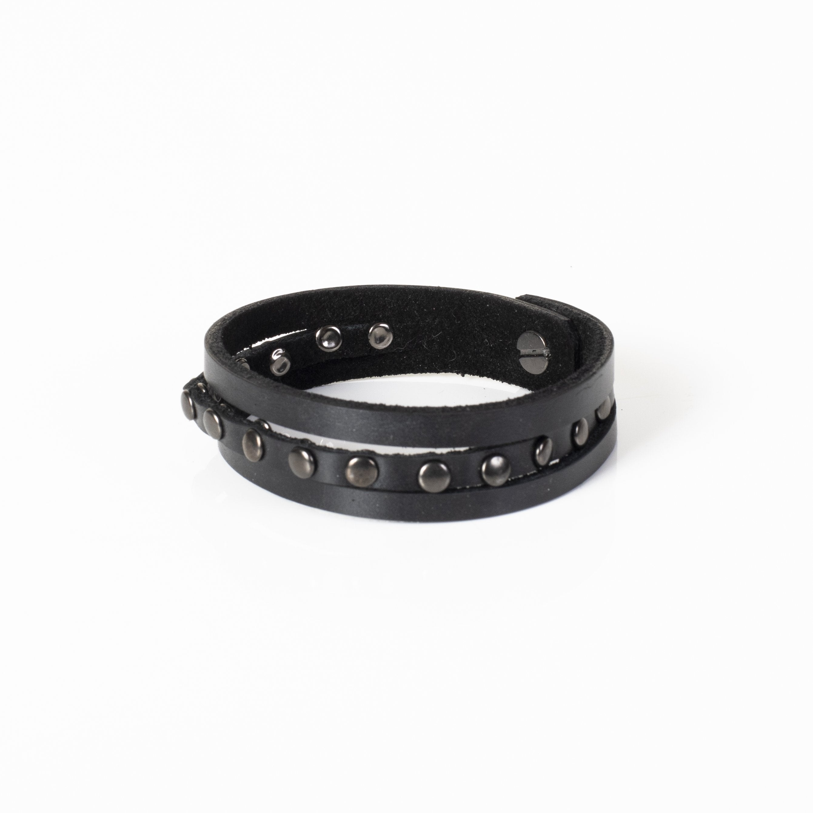 Handmade black double-wrap leather bracelet featuring gunmetal studs and a secure snap closure.